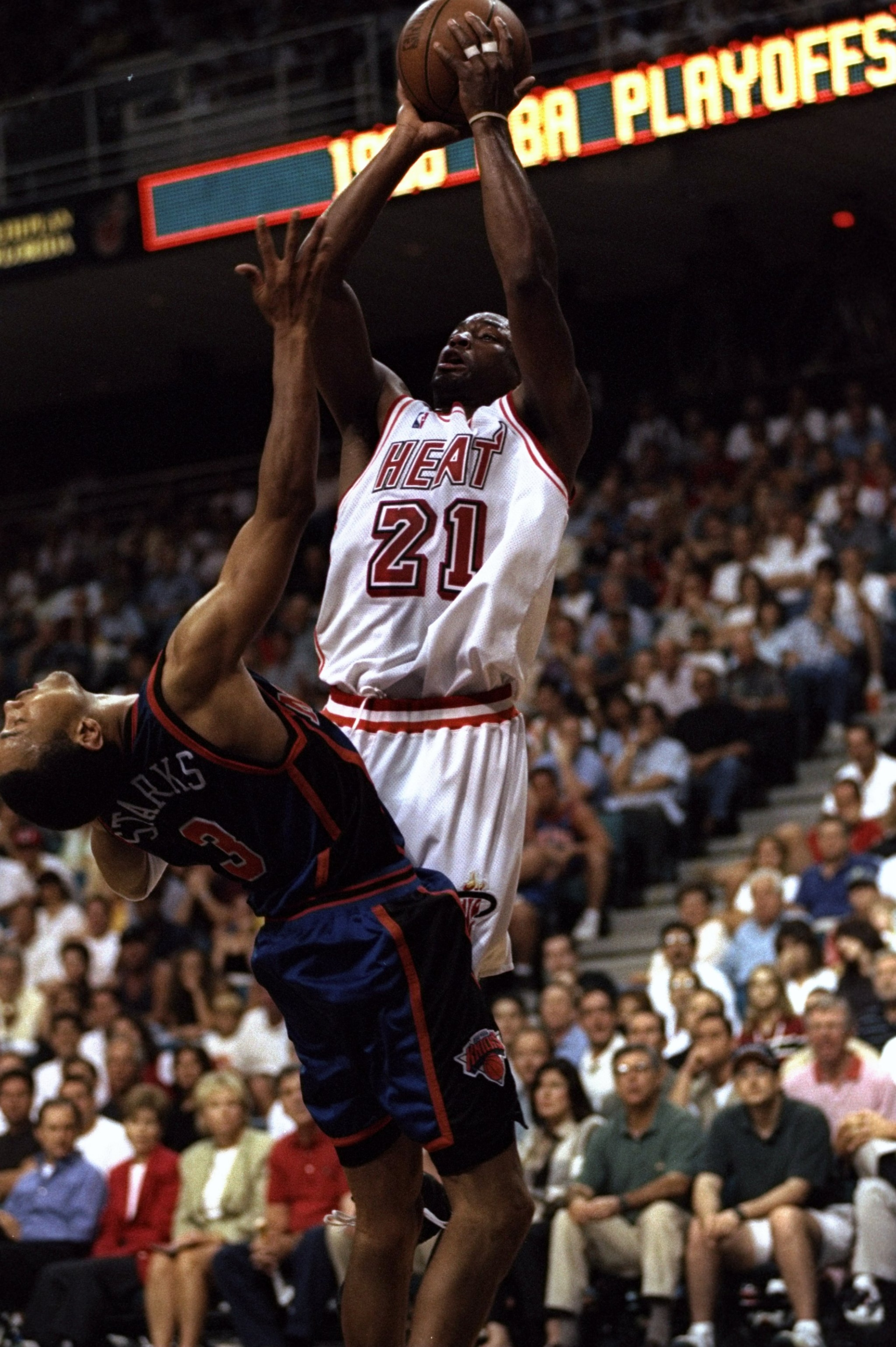 3 May 1998:  Voshon Lenard #21 of the Miami Heat shoots over John Starks #3 of the New York Knicks during game five, of the first round of the Eastern Conference Playoffs at the Miami Arena in Miami, Florida. The Knicks defeated the Heat 98-81. Mandatory