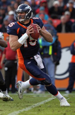 DENVER - DECEMBER 26:  Quarterback Tim Tebow #15 of the Denver Broncos rolls out and looks to deliver a pass against the Houston Texas at INVESCO Field at Mile High on December 26, 2010 in Denver, Colorado. The Broncos defeated the Texans 24-23.  (Photo b