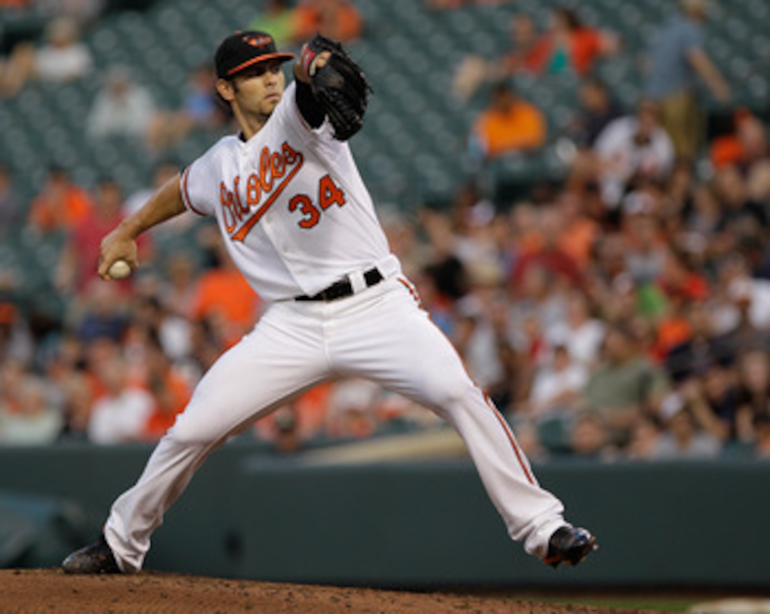 BALTIMORE, MD - MAY 25: Starting pitcher Jake Arrieta #34 of the Baltimore Orioles delivers to a Kansas City Royals batter during the second inning at Oriole Park at Camden Yards on May 25, 2011 in Baltimore, Maryland.  (Photo by Rob Carr/Getty Images)