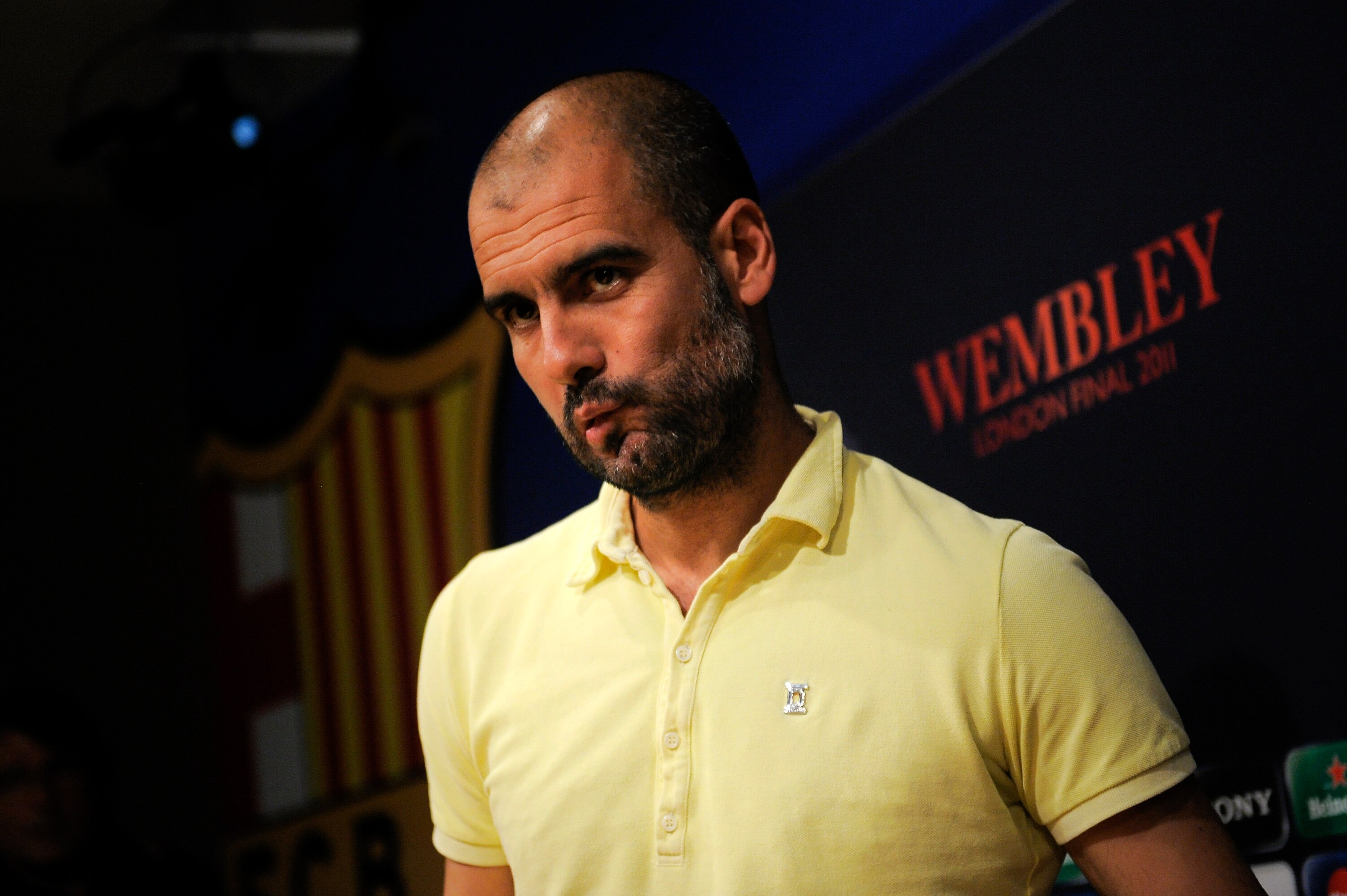 BARCELONA, SPAIN - MAY 23:  Coach Josep Guardiola of Barcelona arrives to the press conference prior to the FC Barcelona training session held ahead of next Saturday's UEFA Champions League Final at the Camp Nou Stadium on May 23, 2011 in Barcelona, Spain