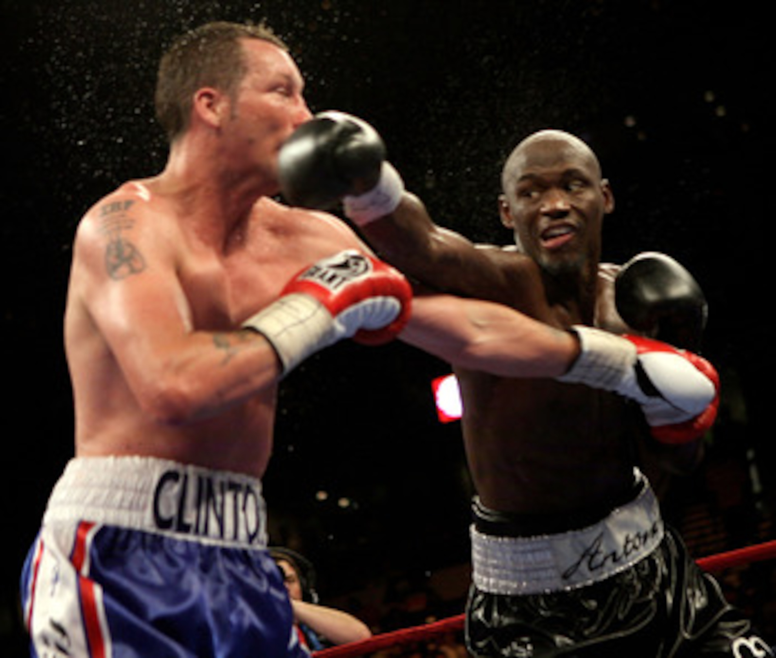 TAMPA, FLORIDA - APRIL 12: Action between Clinton Woods (L) and Antonio Tarver during their IBO, IBF light-Heavyweight title fight on April 12, 2008 at St. Pete Times Forum, Tampa, Florida. (Photo by John Gichigi/Getty Images)