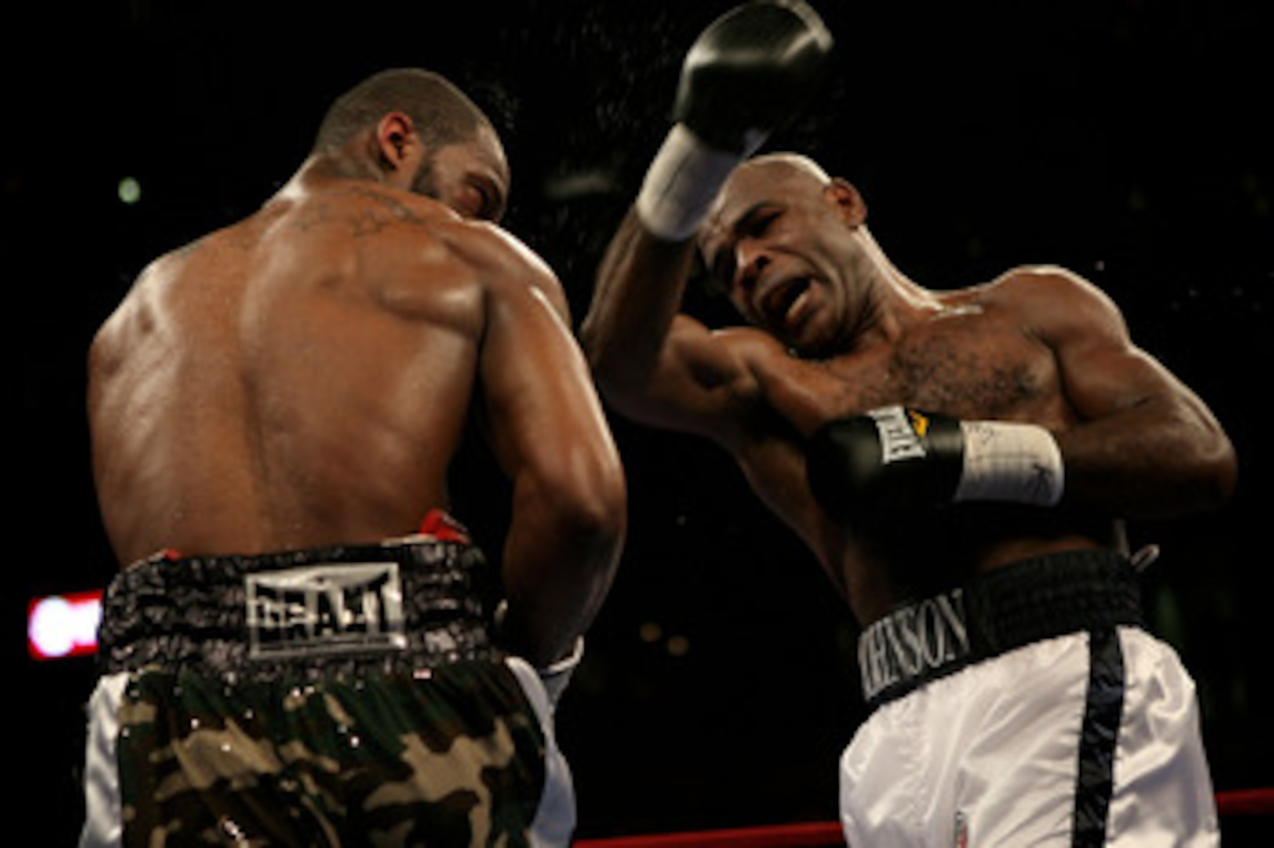 TAMPA, FLORIDA - APRIL 12:   Action between Chad Dawson (L) and  Glen Johnson during the WBC Light Heavyweight title fight on Saturday April 12, 2008 at St. Pete Times Forum, Tampa, Florida.  (Photo by John Gichigi/Getty Images)