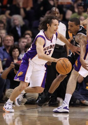PHOENIX, AZ - APRIL 13:  Steve Nash #13 of the Phoenix Suns drives the ball during the NBA game against the San Antonio Spurs at US Airways Center on April 13, 2011 in Phoenix, Arizona.  NOTE TO USER: User expressly acknowledges and agrees that, by downlo