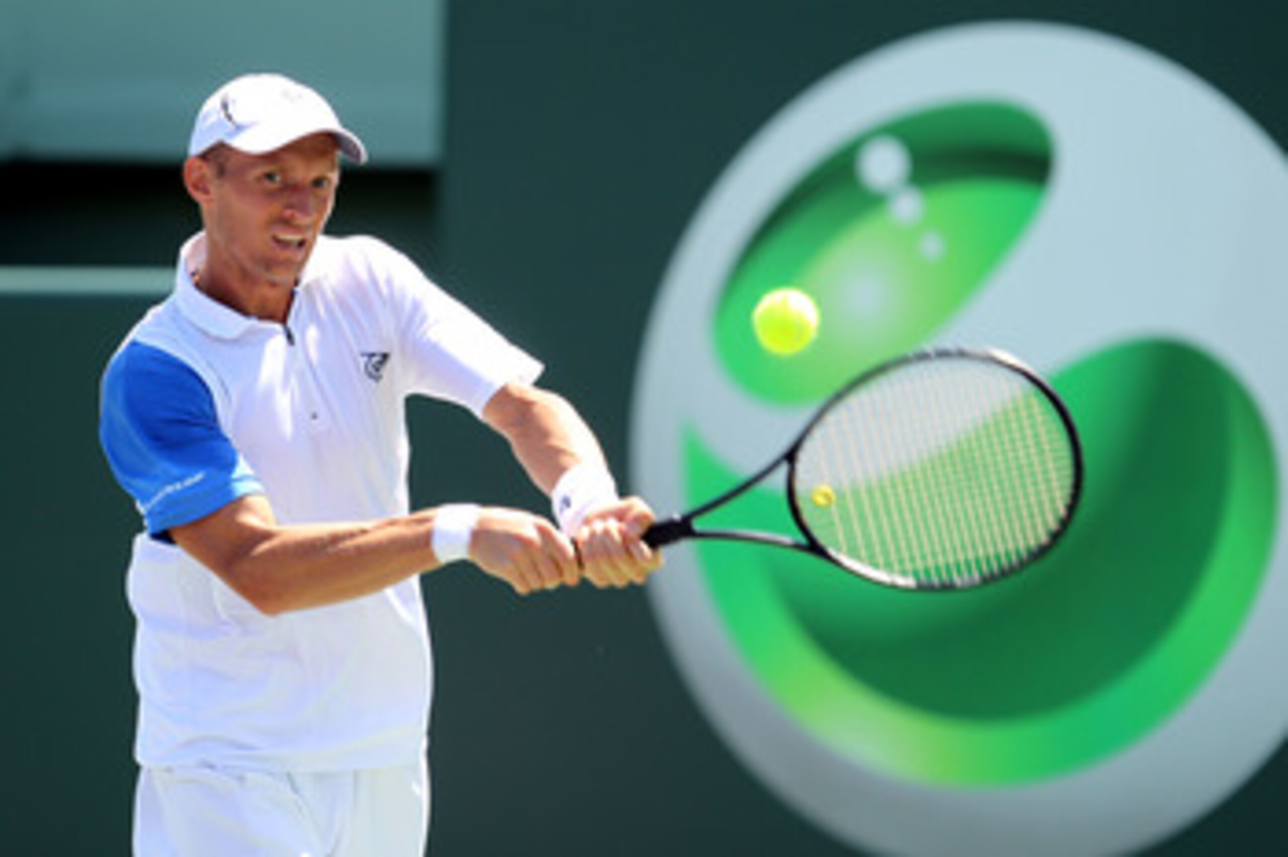 KEY BISCAYNE, FL - MARCH 23:  Nikolay Davydenko of Russia hits a return against Kevin Anderson of South Africa during the Sony Ericsson Open at Crandon Park Tennis Center on March 23, 2011 in Key Biscayne, Florida.  (Photo by Al Bello/Getty Images)