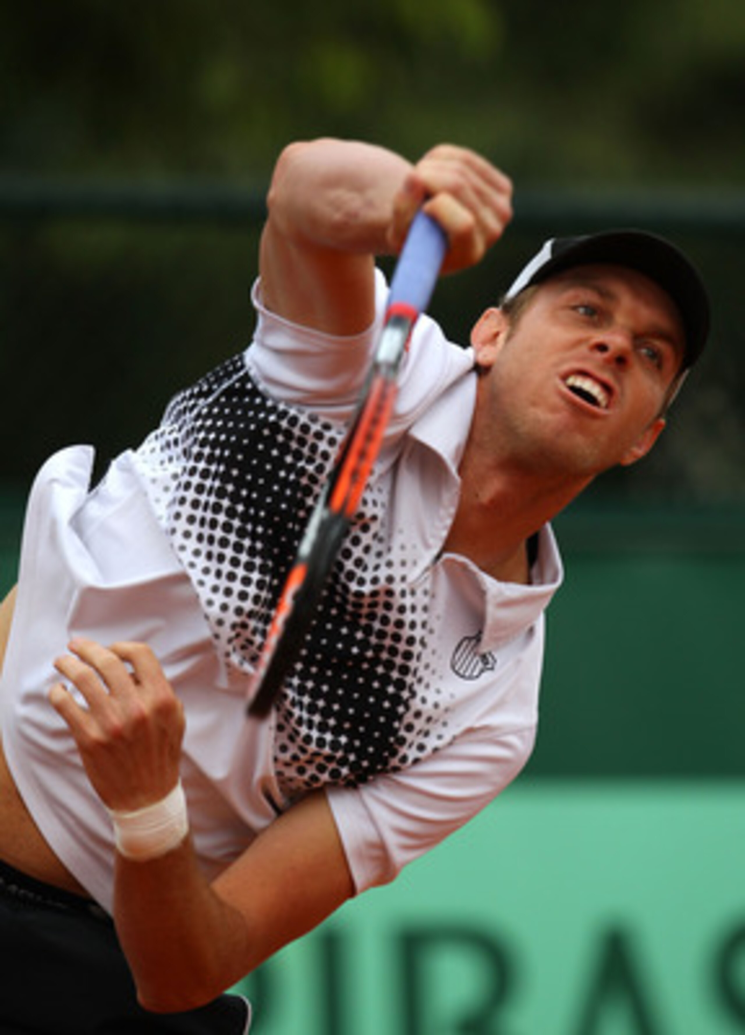 PARIS, FRANCE - MAY 26:  Sam Querrey of USA serves during the men's singles round two match between Sam Querrey of USA and Ivan Lubicic of Croatia on day five of the French Open at Roland Garros on May 26, 2011 in Paris, France.  (Photo by Alex Livesey/Ge