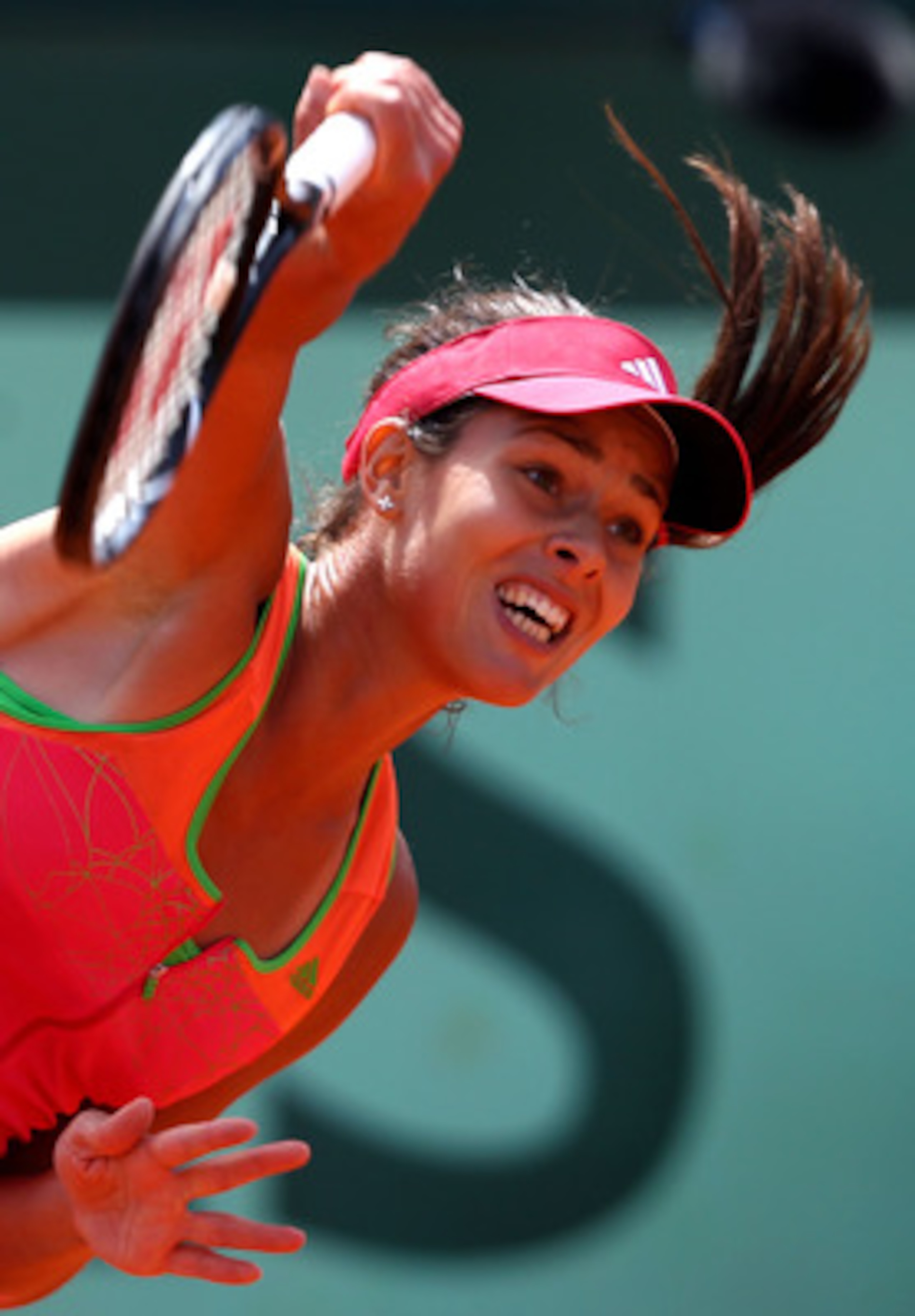 PARIS, FRANCE - MAY 24:  Ana Ivanovic of Serbia serves during the women's singles round one match between Johanna Larsson of Sweden and Ana Ivanovic of Serbia on day three of the French Open at Roland Garros on May 24, 2011 in Paris, France.  (Photo by Cl
