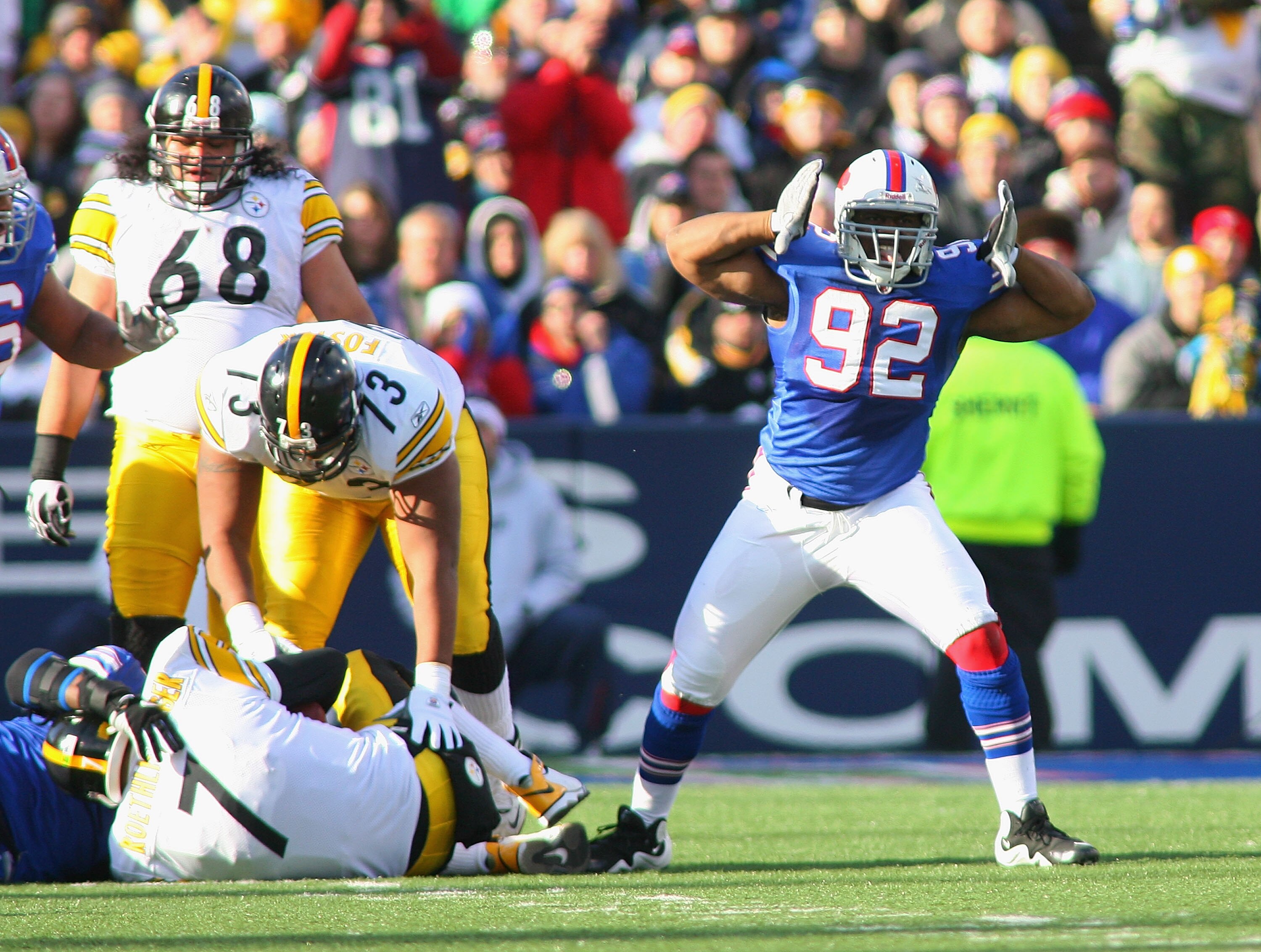 ORCHARD PARK, NY - NOVEMBER 28: Alex Carrington #92 of the Buffalo Bills reacts after sacking Ben Roethlisberger #7 of the Pittsburgh Steelers at Ralph Wilson Stadium at Ralph Wilson Stadium on November 28, 2010 in Orchard Park, New York.  (Photo by Rick