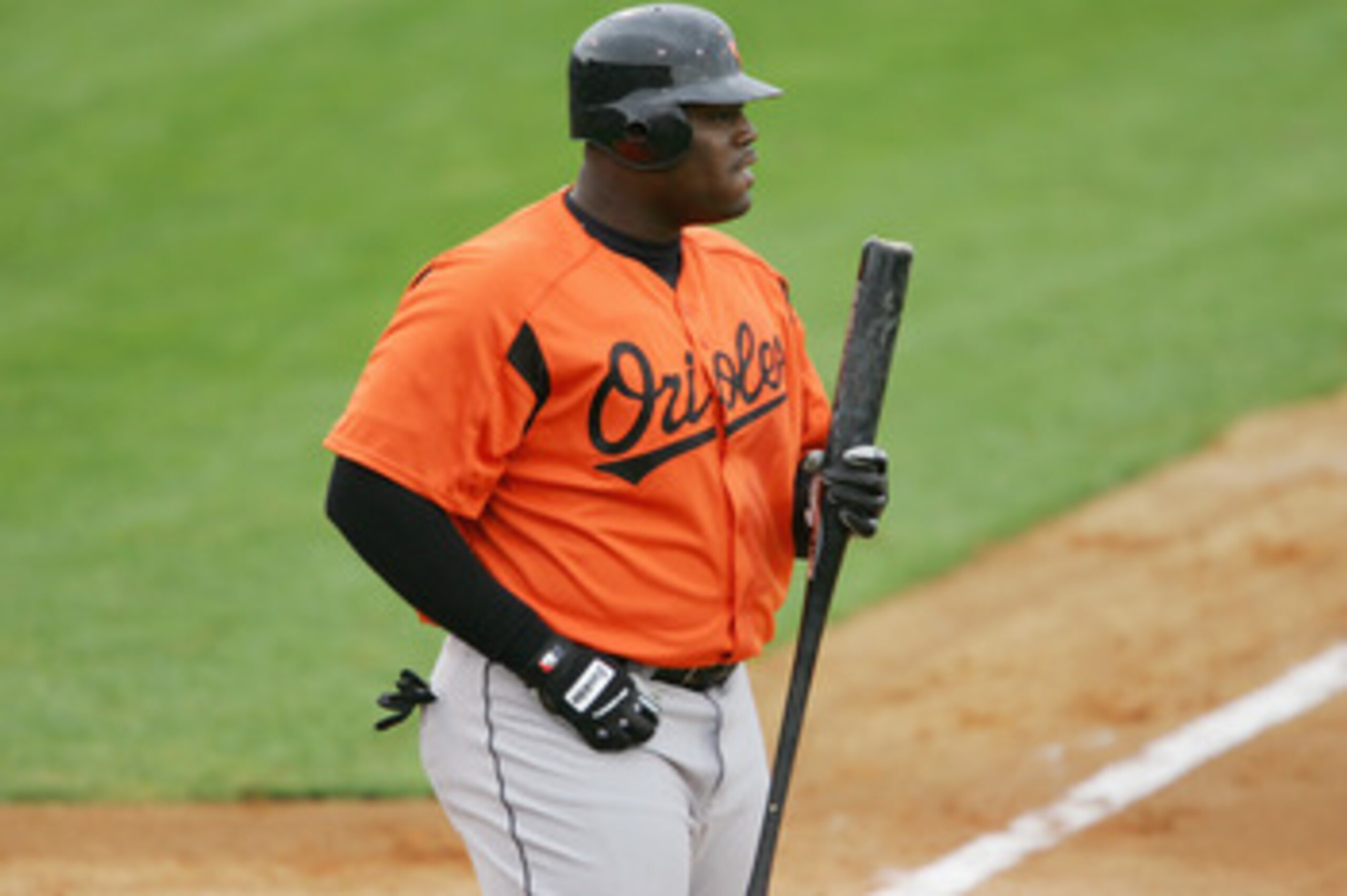 JUPITER, FL - MARCH 3 : Indfielder Walter Young #75 of the Baltimore Orioles looks on against the Florida Marlins during a spring training game on March 3, 2005 at Roger Dean Stadium in Jupiter, Florida. The Baltimore Orioles defeated the Florida Marlins JUPITER, FL - MARCH 3 : Indfielder Walter Young #75 of the Baltimore Orioles looks on against the Florida Marlins during a spring training game on March 3, 2005 at Roger Dean Stadium in Jupiter, Florida. The Baltimore Orioles defeated the Florida Marlins