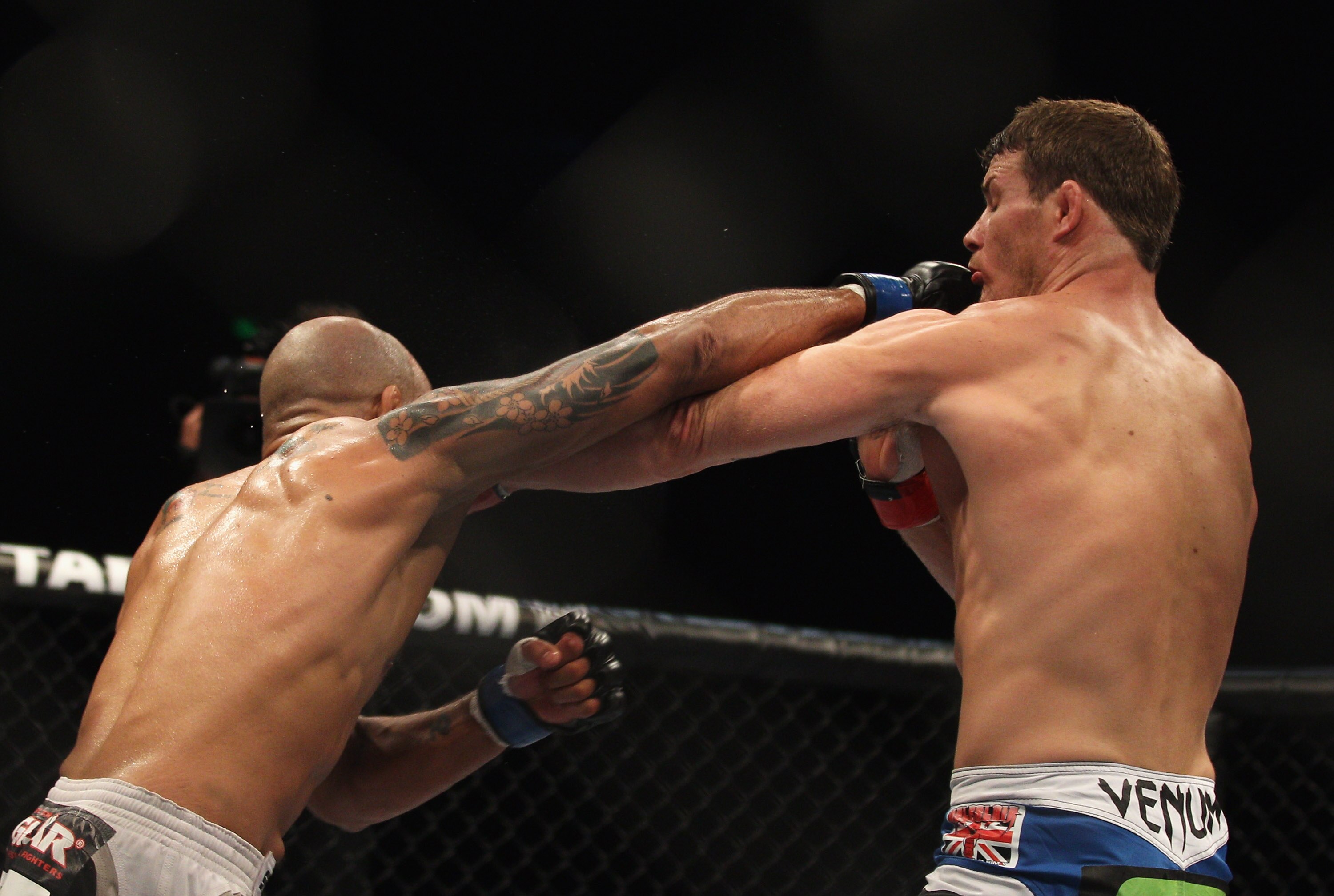 SYDNEY, AUSTRALIA - FEBRUARY 27:  Jorge Rivera of the USA and Michael Bisping of Great Britaintrade blows in their middleweight bout part of at UFC 127 at Acer Arena on February 27, 2011 in Sydney, Australia.  (Photo by Mark Kolbe/Getty Images)