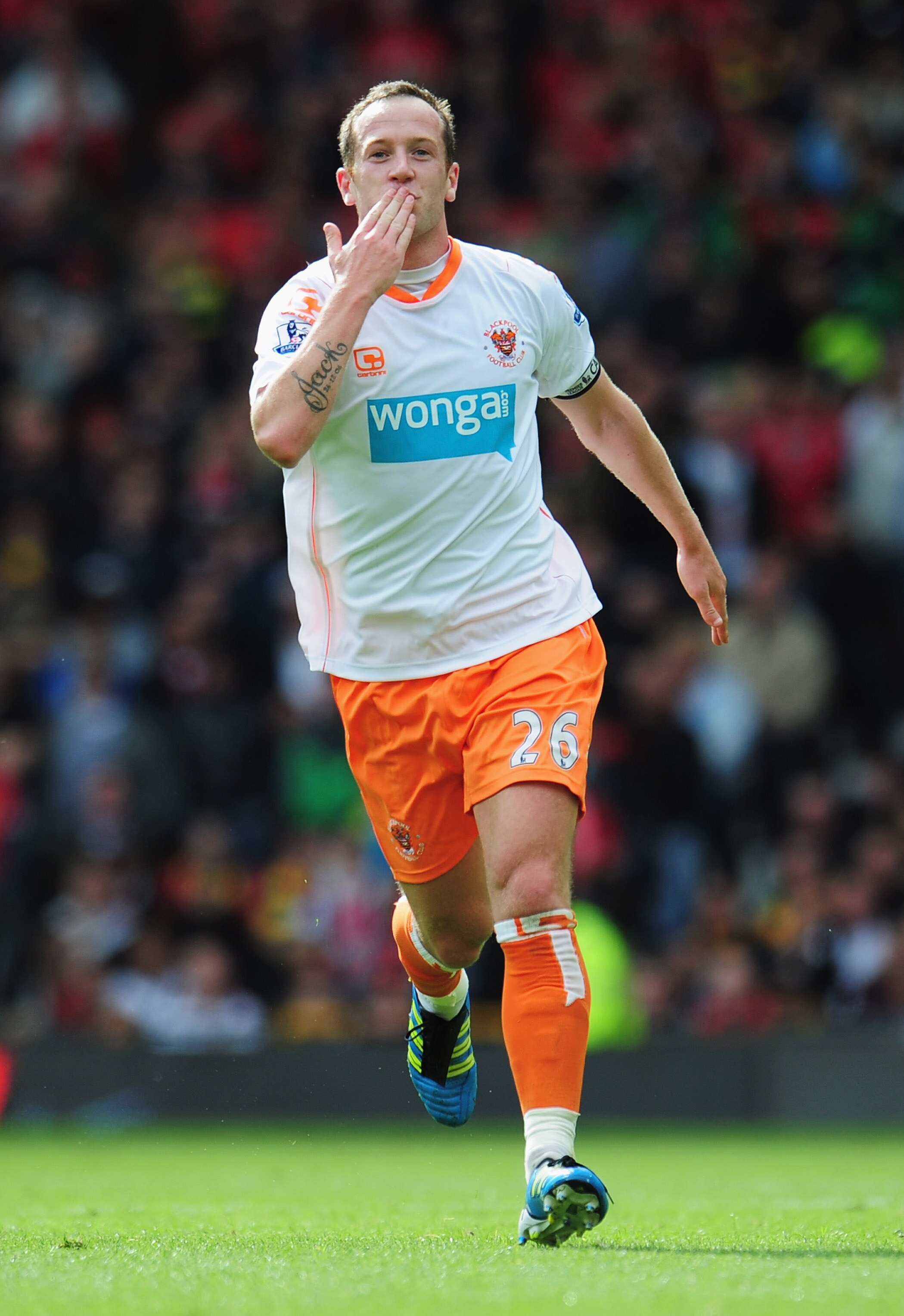 MANCHESTER, ENGLAND - MAY 22:  Charlie Adam of Blackpool celebrates as scores their first goal from a free kick during the Barclays Premier League match between Manchester United and Blackpool at Old Trafford on May 22, 2011 in Manchester, England.  (Phot