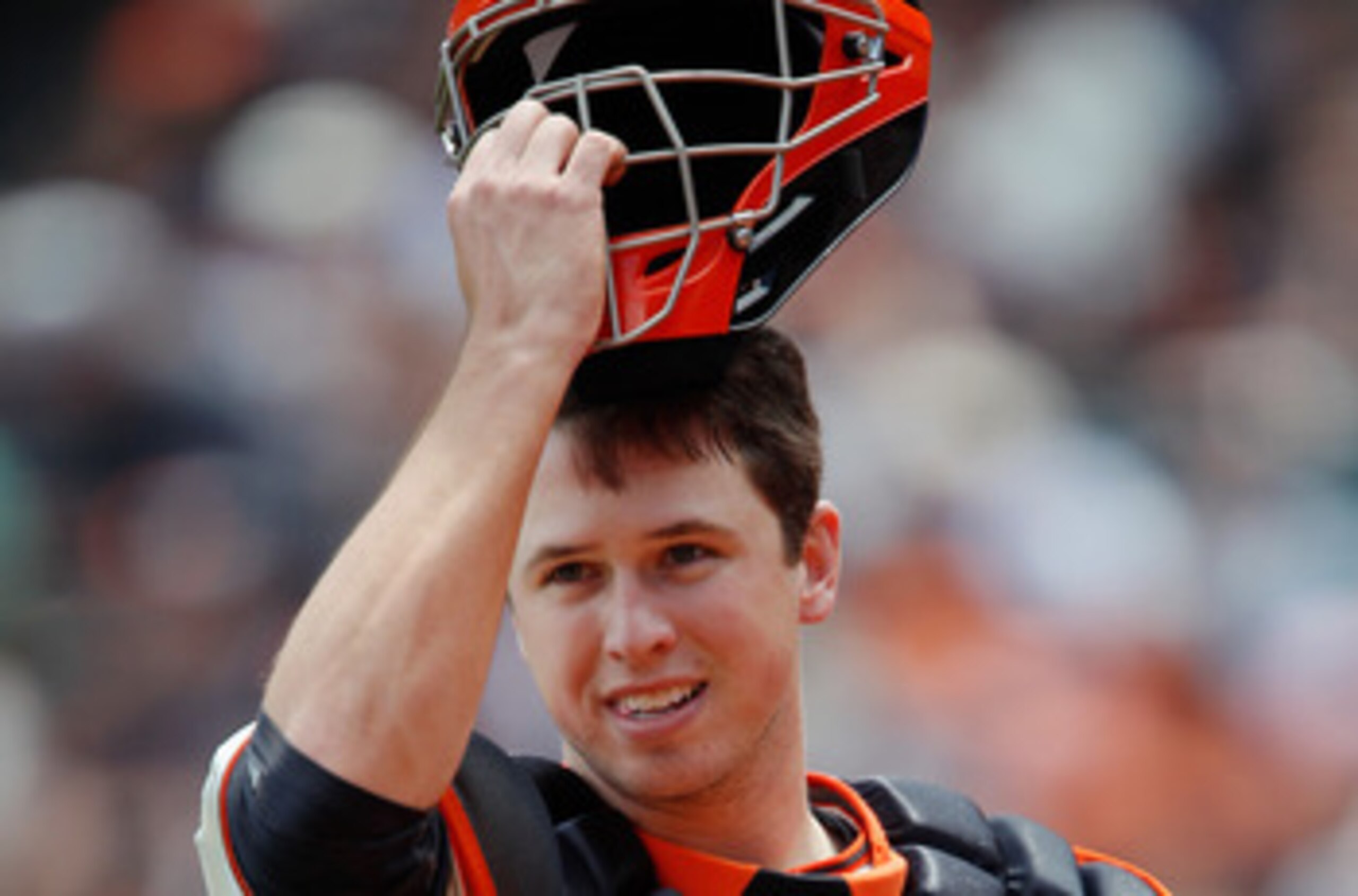 SAN FRANCISCO, CA - MAY 22:  Catcher Buster Posey #28 of the San Francisco Giants heads to the dugout after getting out of an inning against the Oakland A's at AT&T Park on May 22, 2011 in San Francisco, California.  The Giants won 5-4 in 11 innings.  (Ph