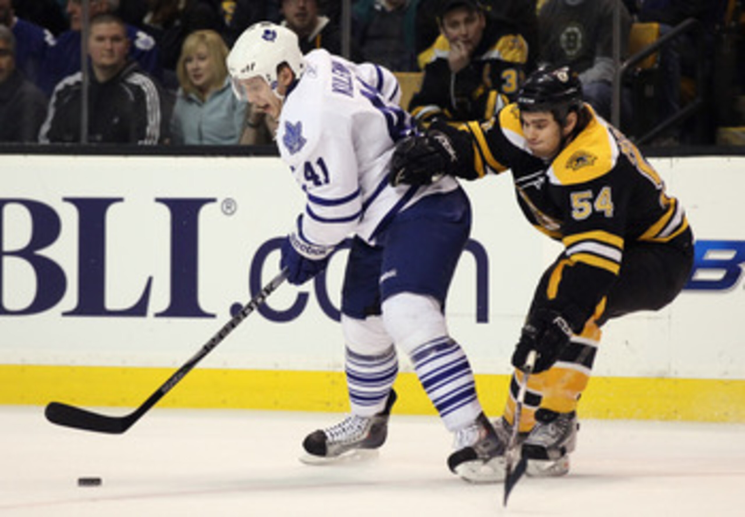 BOSTON, MA - MARCH 31: Nikolai Kulemin #41 of the Toronto Maple Leafs tries to keep the puck from Adam McQuaid #54 of the Boston Bruins on March 31, 2011 at the TD Garden in Boston, Massachusetts. (Photo by Elsa/Getty Images) BOSTON, MA - MARCH 31: Nikolai Kulemin #41 of the Toronto Maple Leafs tries to keep the puck from Adam McQuaid #54 of the Boston Bruins on March 31, 2011 at the TD Garden in Boston, Massachusetts. (Photo by Elsa/Getty Images)