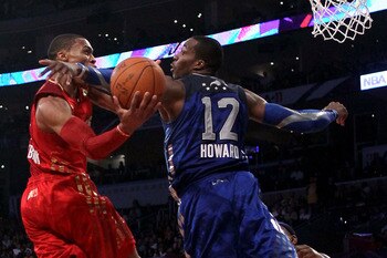 LOS ANGELES, CA - FEBRUARY 20:  Russell Westbrook #0 of the Oklahoma City Thunder and the Western Conference goes up for a shot over Dwight Howard #12 of the Orlando Magic and the Eastern Conference in the 2011 NBA All-Star Game at Staples Center on Febru