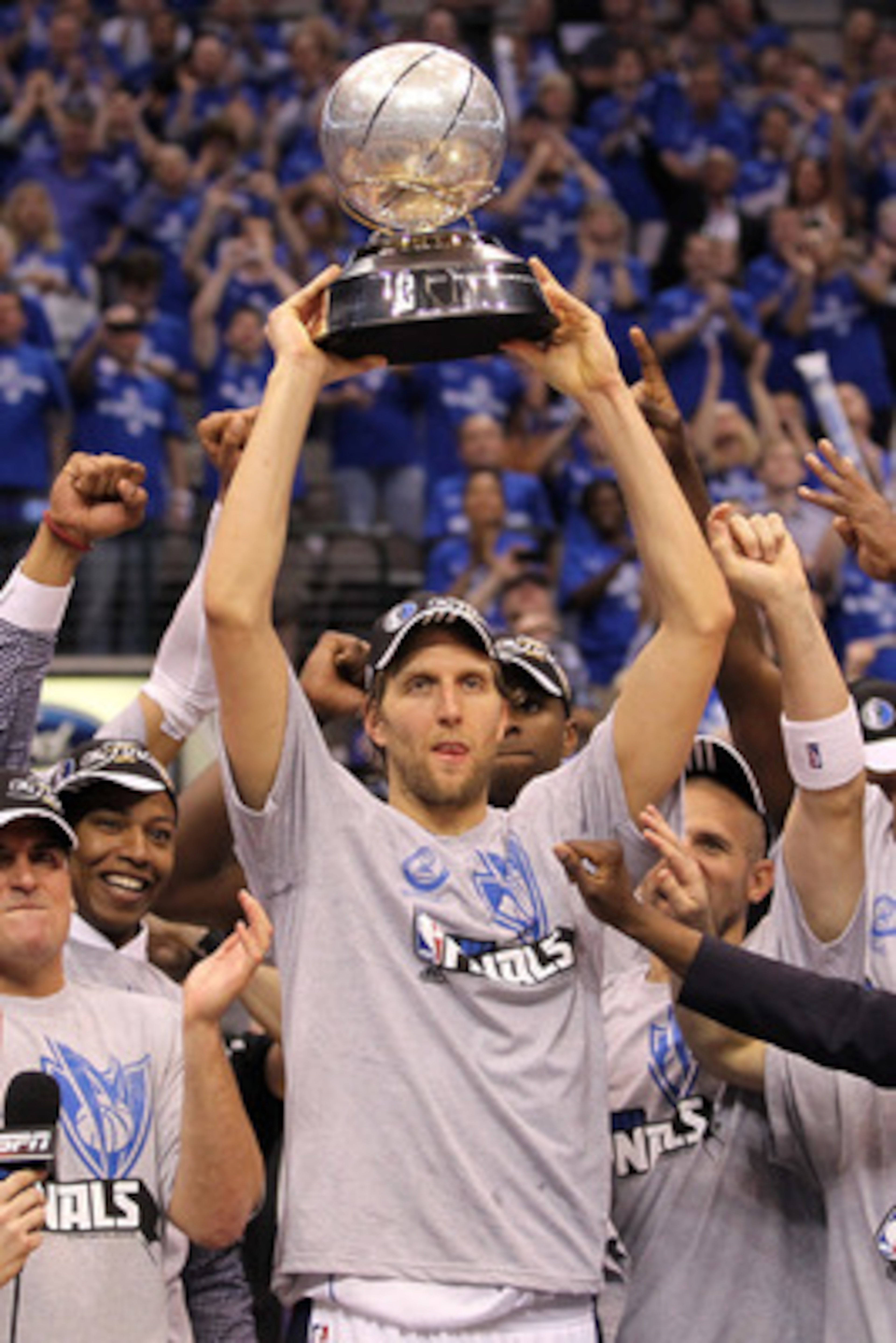 DALLAS, TX - MAY 25:  Dirk Nowitzki #41 and the Dallas Mavericks celebrate their 100-96 victory against the Oklahoma City Thunder in Game Five of the Western Conference Finals during the 2011 NBA Playoffs at American Airlines Center on May 25, 2011 in Dal