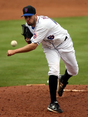 PORT ST. LUCIE, FL - MARCH 03:  Pitcher Oliver Perez #46 of the New York Mets throws against the St. Louis Cardinals at Digital Domain Park on March 3, 2011 in Port St. Lucie, Florida.  (Photo by Marc Serota/Getty Images)