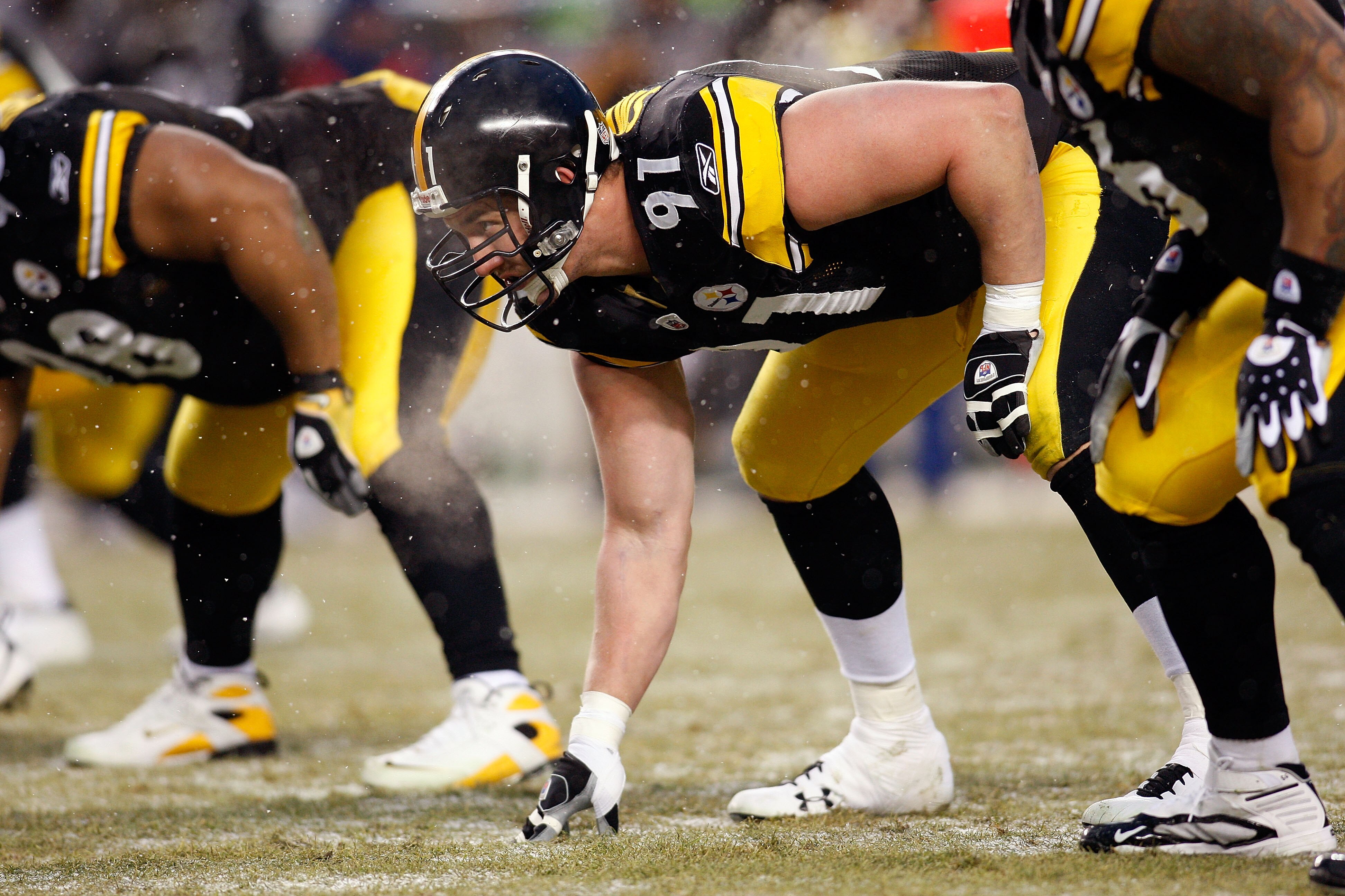 PITTSBURGH - JANUARY 11:  Aaron Smith #91 of the Pittsburgh Steelers lines up on defense against the San Diego Chargers during their AFC Divisional Playoff Game on January 11, 2009 at Heinz Field in Pittsburgh, Pennsylvania.  (Photo by Chris Graythen/Gett