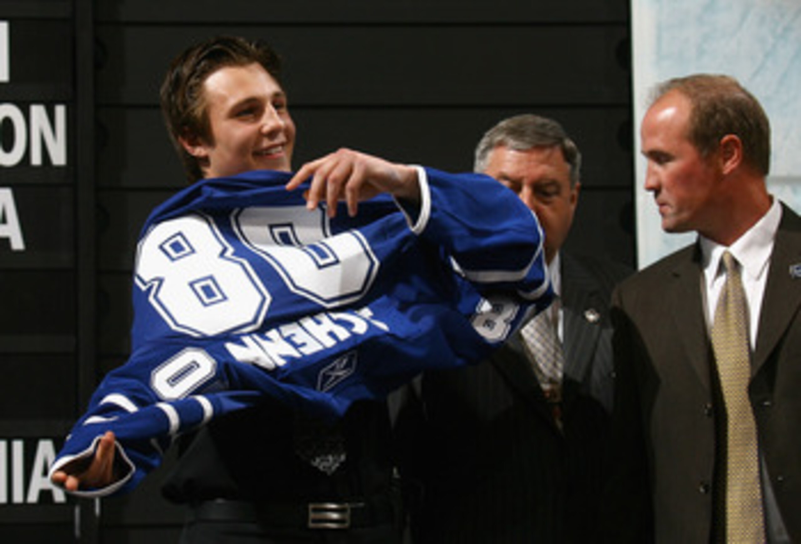 OTTAWA, ON - JUNE 20: Fifth overall pick, Luke Schenn of the Toronto Maple Leafs puts on his new team jersey after being selected in the 2008 NHL Entry Draft at Scotiabank Place on June 20, 2008 in Ottawa, Ontario, Canada. (Photo by Bruce Bennett/Getty OTTAWA, ON - JUNE 20: Fifth overall pick, Luke Schenn of the Toronto Maple Leafs puts on his new team jersey after being selected in the 2008 NHL Entry Draft at Scotiabank Place on June 20, 2008 in Ottawa, Ontario, Canada. (Photo by Bruce Bennett/Getty