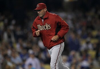 LOS ANGELES, CA - MAY 13:  Manager Kirk Gibson of the Arizona Diamondbacks returns to the dugout after making a a pitching change in the game with the Los Angeles Dodgers on May 13, 2011 at Dodger Stadium in Los Angeles, California.  (Photo by Stephen Dun