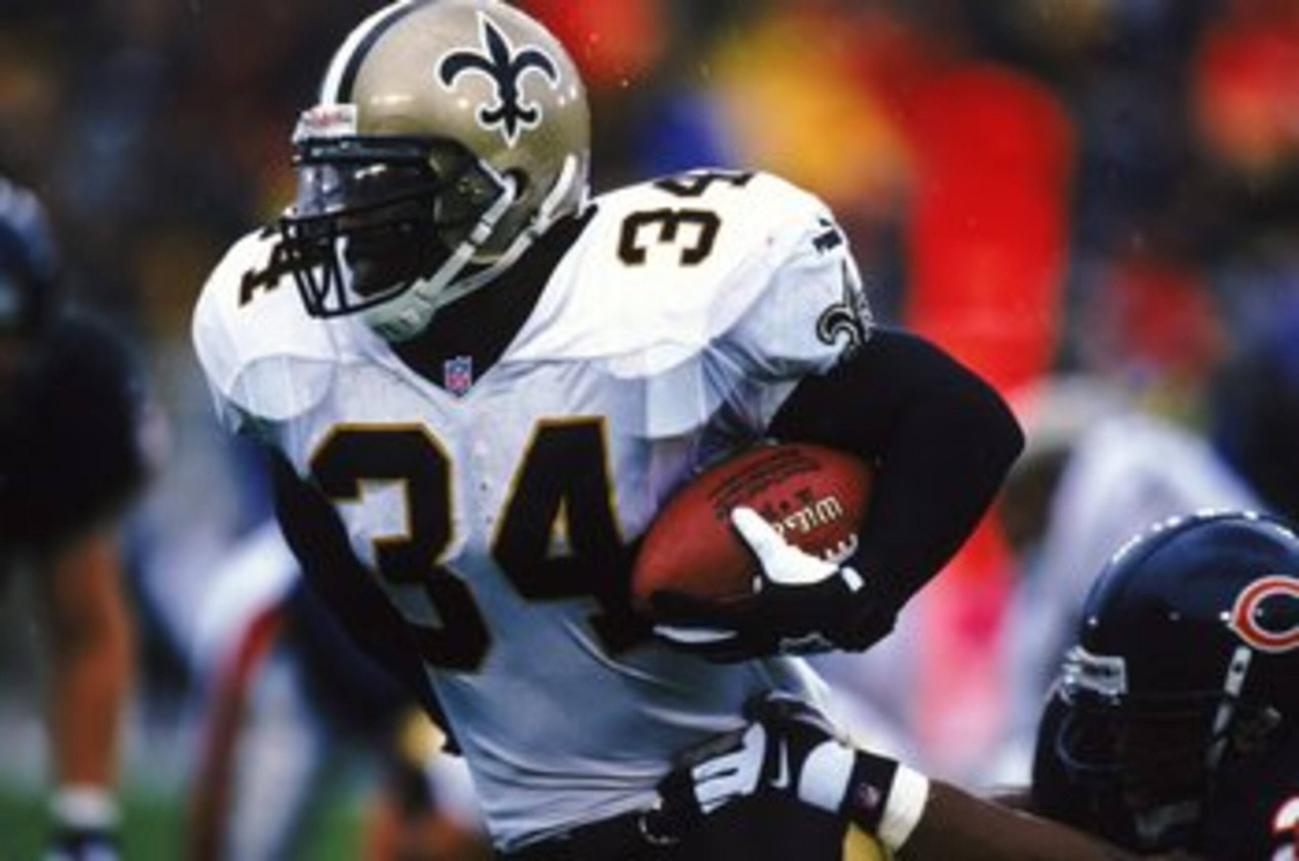 3 Oct 1999:  Ricky Williams #34 of the New Orleans Saints moves with the ball during the game against the Chicago Bears at Soldier Field in Chicago, Illinois. The Bears defeated the Saints 14-10. Mandatory Credit: Jonathan Daniel  /Allsport