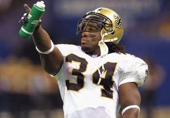 7 Oct 2001: Ricky Williams #34 of the New Orleans Saints points to the scoreboard during the game against the Minnesota Vikings at the Superdome in New Orleans, Louisiana. The Saints won 28-15. DIGITAL IMAGE. Mandatory Credit: Ronald Martinez/ALLSPORT