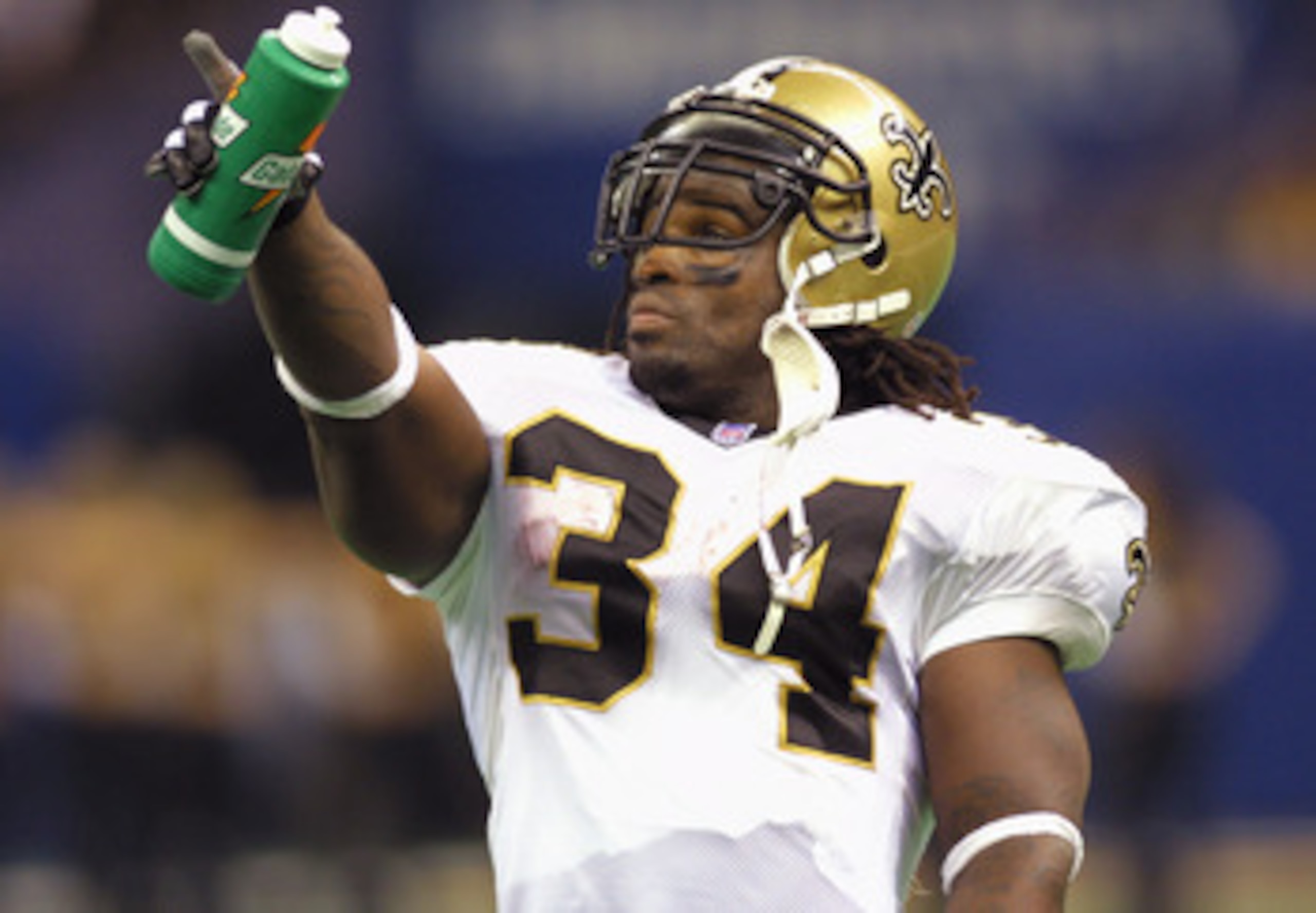 7 Oct 2001: Ricky Williams #34 of the New Orleans Saints points to the scoreboard during the game against the Minnesota Vikings at the Superdome in New Orleans, Louisiana. The Saints won 28-15. DIGITAL IMAGE. Mandatory Credit: Ronald Martinez/ALLSPORT