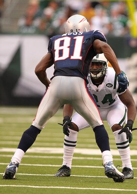 EAST RUTHERFORD, NJ - SEPTEMBER 19:  Darrelle Revis #24 of the New York Jets defends against Randy Moss #81 of the New England Patriots during their  game on September 19, 2010 at the New Meadowlands Stadium  in East Rutherford, New Jersey.  (Photo by Al 