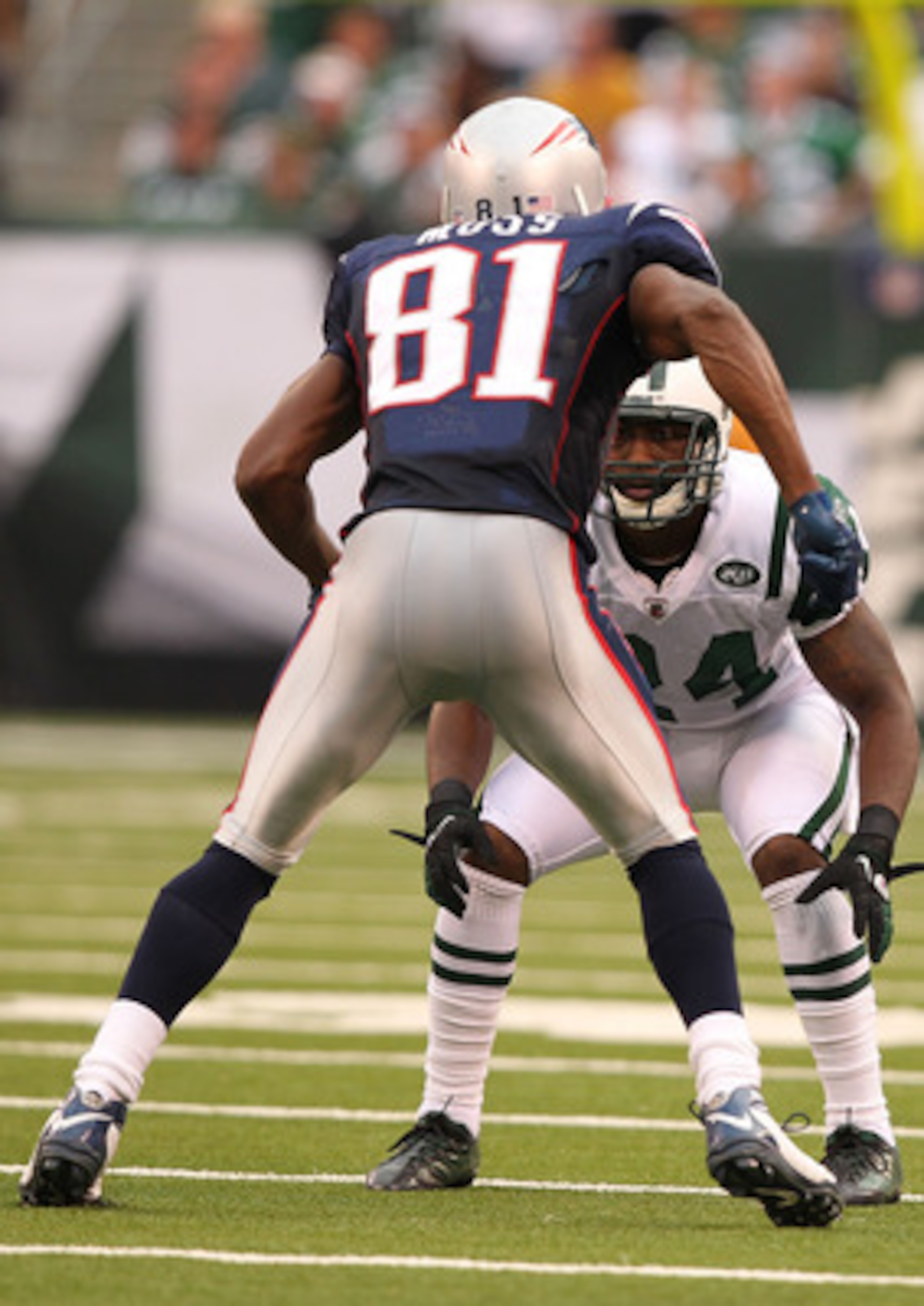 EAST RUTHERFORD, NJ - SEPTEMBER 19:  Darrelle Revis #24 of the New York Jets defends against Randy Moss #81 of the New England Patriots during their  game on September 19, 2010 at the New Meadowlands Stadium  in East Rutherford, New Jersey.  (Photo by Al 
