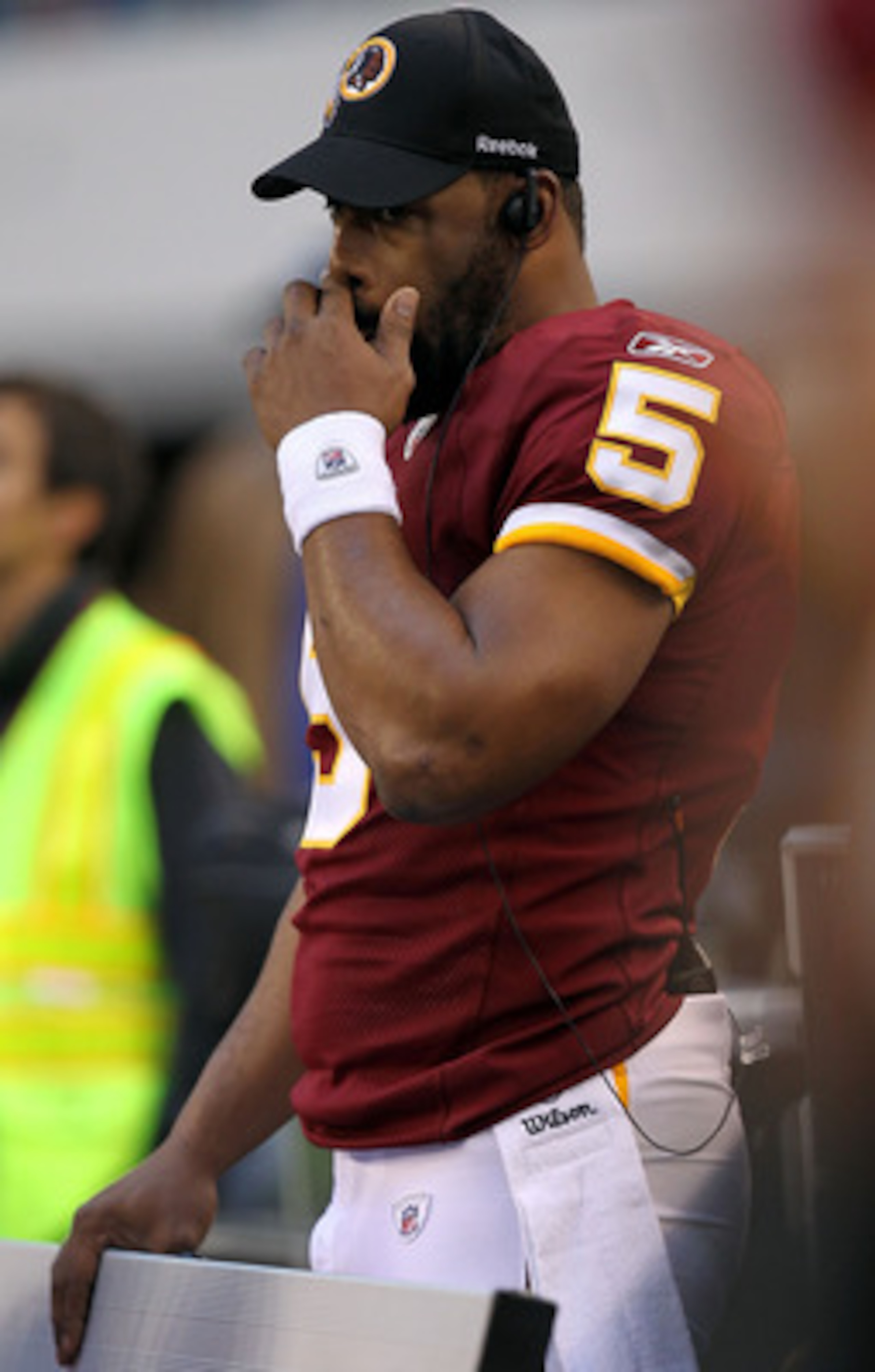 ARLINGTON, TX - DECEMBER 19:  Quarterback Donovan McNabb #5  of the Washington Redskins on the sidelines against play against the Dallas Cowboys at Cowboys Stadium on December 19, 2010 in Arlington, Texas.  (Photo by Ronald Martinez/Getty Images)
