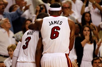 MIAMI, FL - MAY 24:  Dwyane Wade #3 and LeBron James #6 of the Miami Heat celebrate against the Chicago Bulls in Game Four of the Eastern Conference Finals during the 2011 NBA Playoffs on May 24, 2011 at American Airlines Arena in Miami, Florida. The Heat
