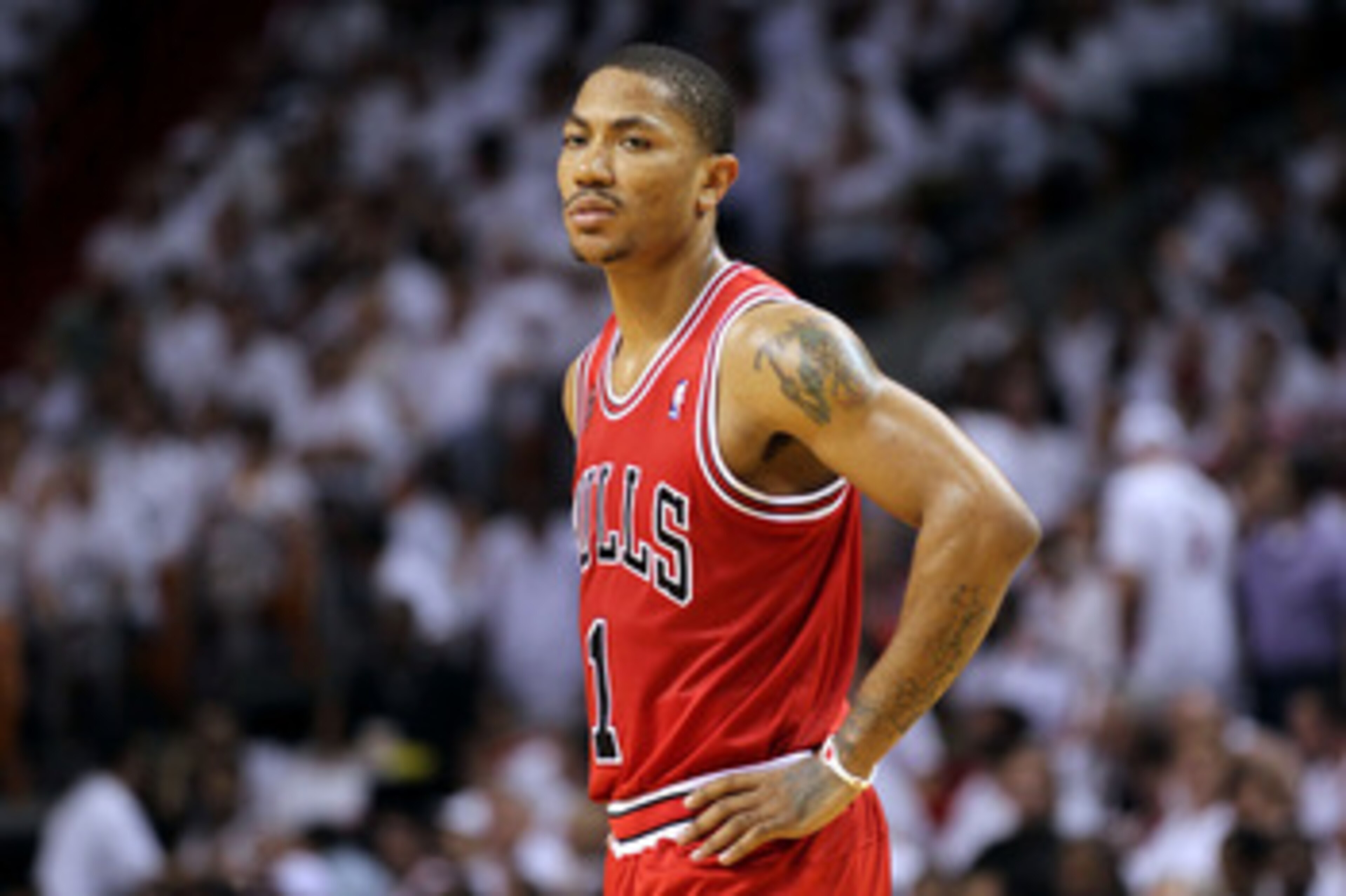 MIAMI, FL - MAY 24: Derrick Rose #1 of the Chicago Bulls looks on against the Miami Heat in Game Four of the Eastern Conference Finals during the 2011 NBA Playoffs on May 24, 2011 at American Airlines Arena in Miami, Florida. NOTE TO USER: User expressly MIAMI, FL - MAY 24: Derrick Rose #1 of the Chicago Bulls looks on against the Miami Heat in Game Four of the Eastern Conference Finals during the 2011 NBA Playoffs on May 24, 2011 at American Airlines Arena in Miami, Florida. NOTE TO USER: User expressly