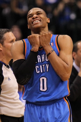 DALLAS, TX - MAY 25:  Russell Westbrook #0 of the Oklahoma City Thunder reacts in the fourth quarter while taking on the Dallas Mavericks in Game Five of the Western Conference Finals during the 2011 NBA Playoffs at American Airlines Center on May 25, 201