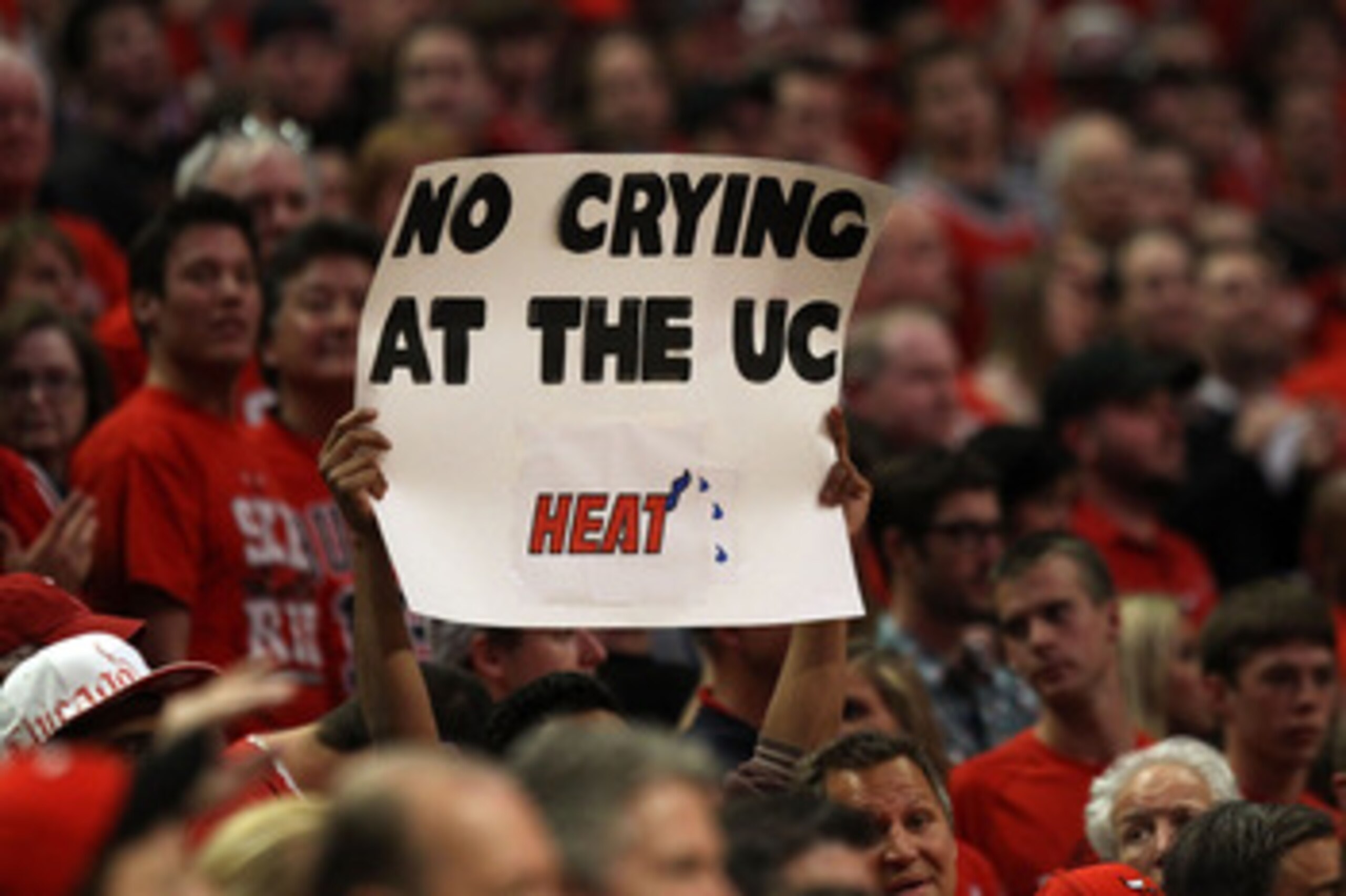 CHICAGO, IL - MAY 15:  A fan of the Chicago Bulls holds up a sign which reads 'No Crying at the UC Heat' against the Miami Heat in Game One of the Eastern Conference Finals during the 2011 NBA Playoffs on May 15, 2011 at the United Center in Chicago, Illi