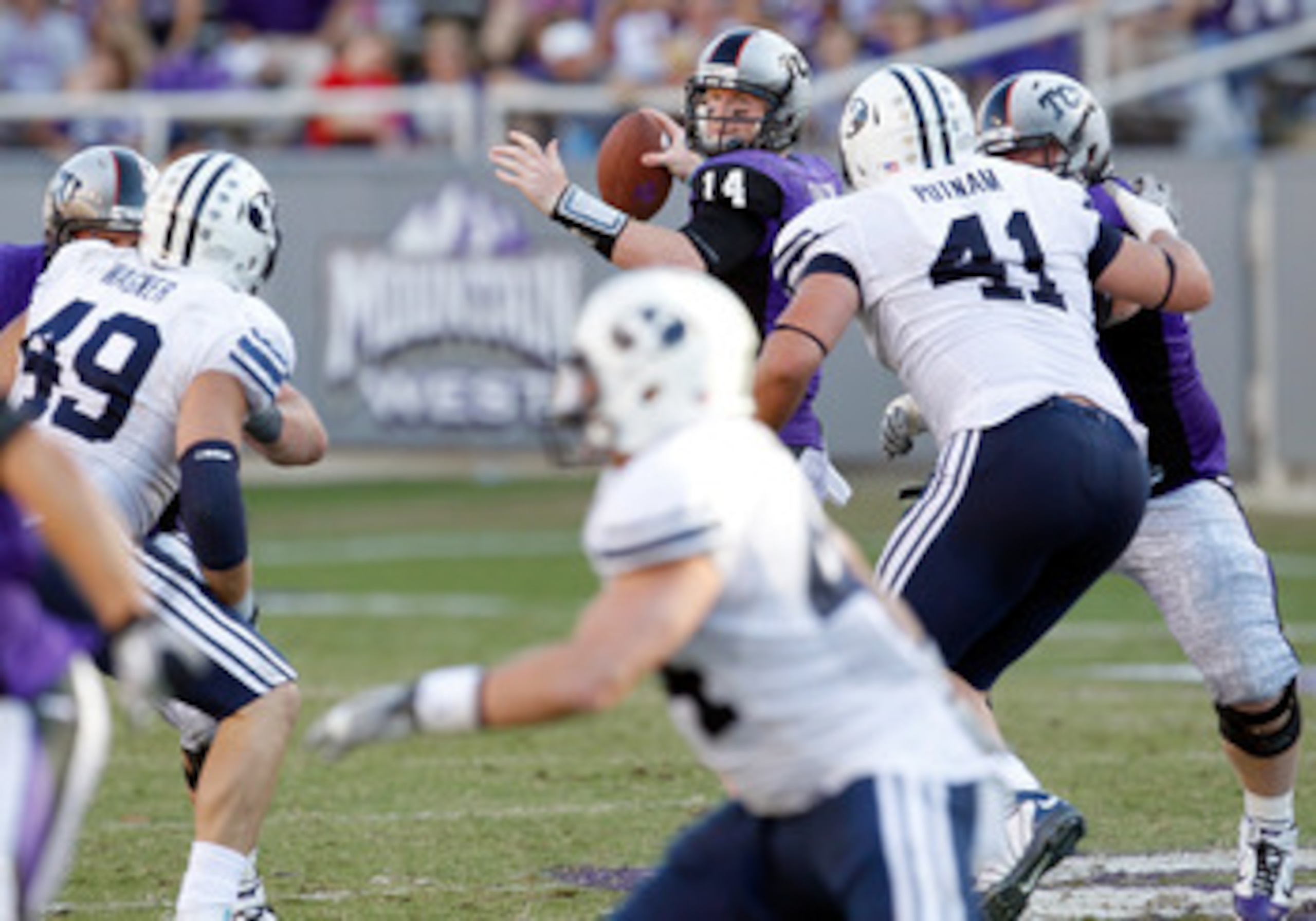 FORT WORTH, TX - OCTOBER 16:  Quarterback Andy Dalton #14 of the TCU Horned Frogs throws a pass against the BYU Cougars at Amon G. Carter Stadium on October 16, 2010 in Fort Worth, Texas. TCU beat BYU 31-3. (Photo by Tom Pennington/Getty Images)