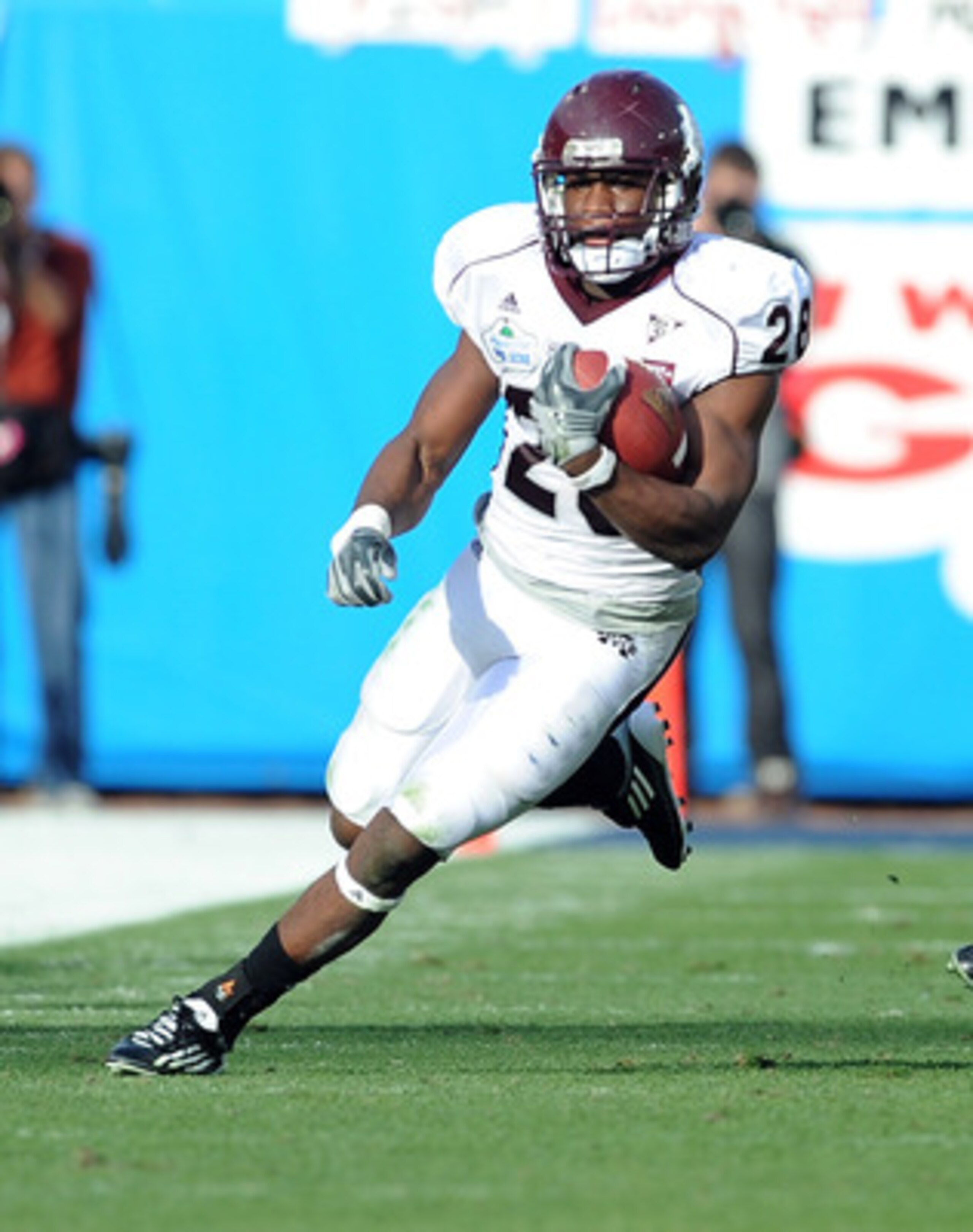 JACKSONVILLE, FL - JANUARY 01:  Running back Vick Ballard #28 of the Mississippi State Bulldogs rushes against the Michigan Wolverines during the Gator Bowl at EverBank Field on January 1, 2011 in Jacksonville, Florida  (Photo by Rick Dole/Getty Images)