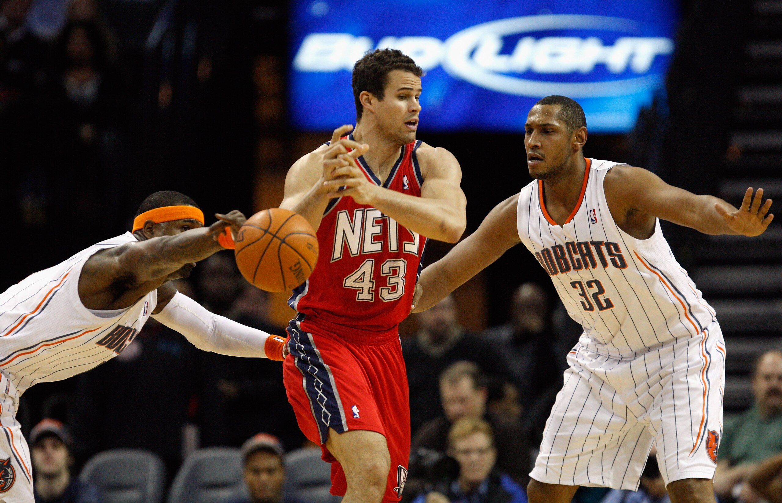 CHARLOTTE, NC - FEBRUARY 11: Kris Humphries #43 of the New Jersey Nets has the ball knocked loose by Stephen Jackson #1 of the Charlotte Bobcats as teammate Boris Diaw #32 watches on during their game at Time Warner Cable Arena on February 11, 2011 in Ch CHARLOTTE, NC - FEBRUARY 11: Kris Humphries #43 of the New Jersey Nets has the ball knocked loose by Stephen Jackson #1 of the Charlotte Bobcats as teammate Boris Diaw #32 watches on during their game at Time Warner Cable Arena on February 11, 2011 in Ch