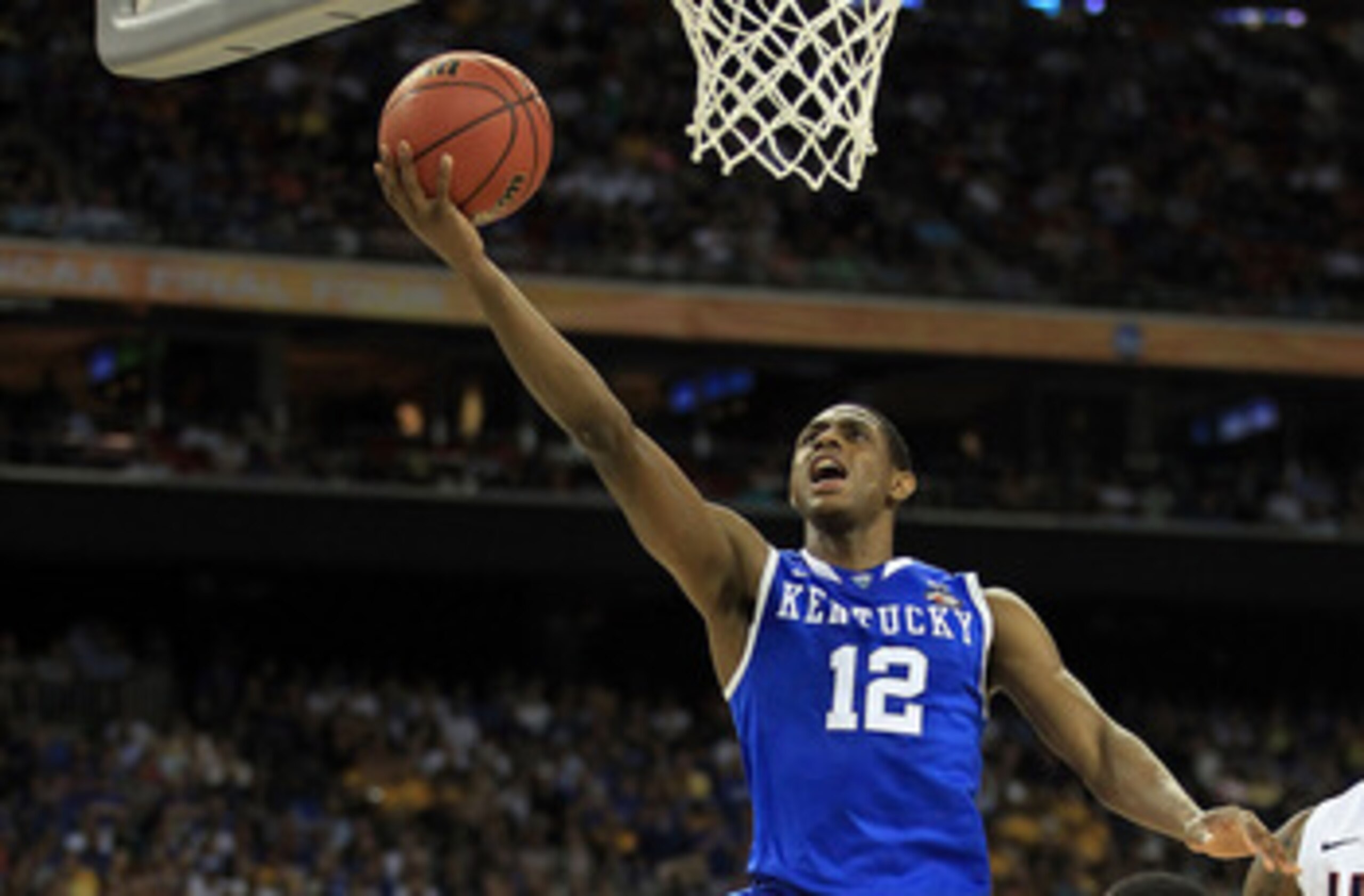 HOUSTON, TX - APRIL 02:  Brandon Knight #12 of the Kentucky Wildcats goes to the basket against the Connecticut Huskies during the National Semifinal game of the 2011 NCAA Division I Men's Basketball Championship at Reliant Stadium on April 2, 2011 in Hou