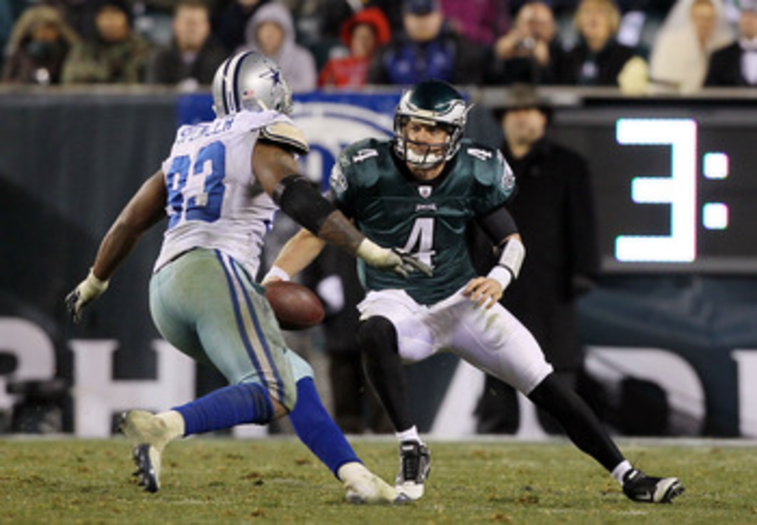 PHILADELPHIA, PA - JANUARY 02:  Kevin Kolb #4 of the Philadelphia Eagles tries to avoid a sack from Anthony Spencer #93 of the Dallas Cowboys on January 2, 2011 at Lincoln Financial Field in Philadelphia, Pennsylvania. The Cowboys defeated the Eagles 14-1