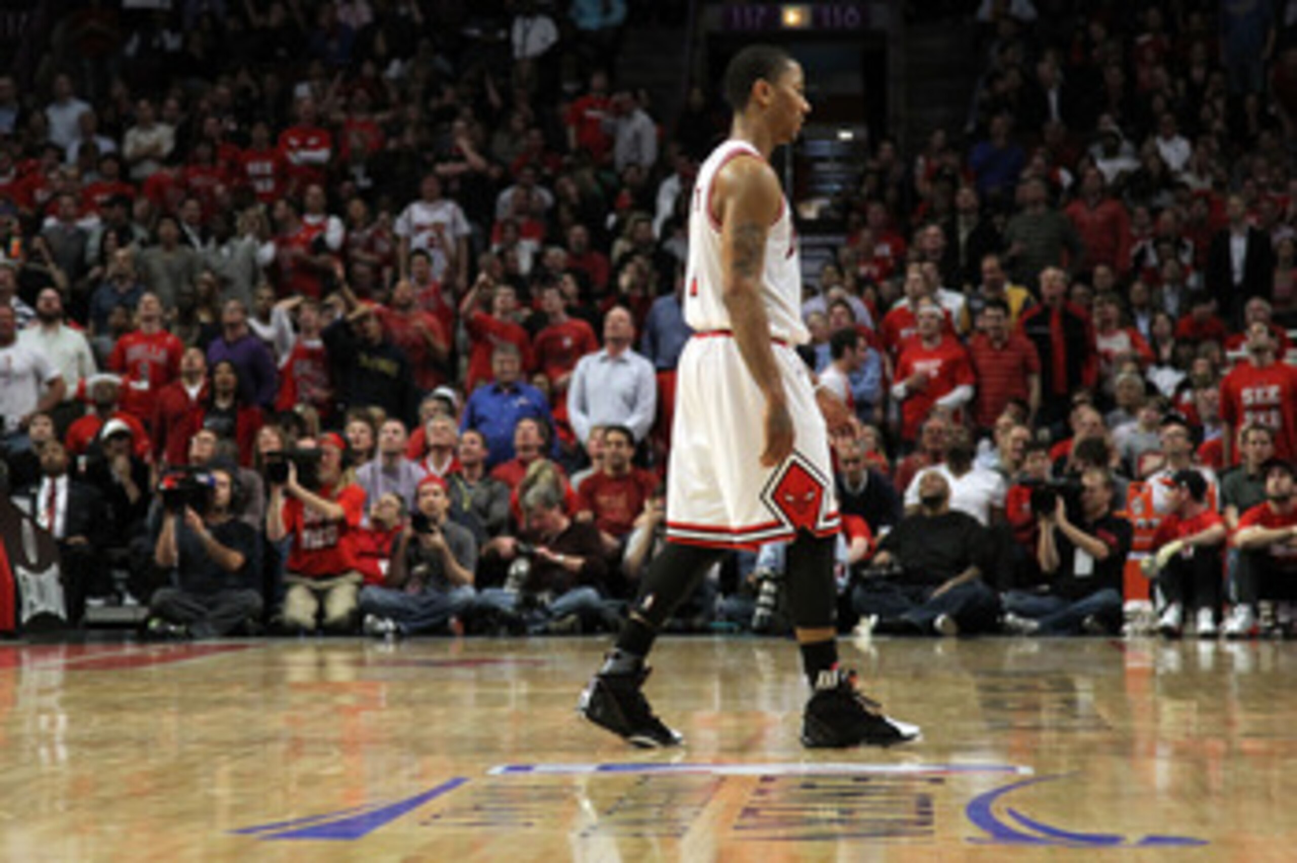 CHICAGO, IL - MAY 26:  Derrick Rose #1 of the Chicago Bulls walks towards the bench against the Miami Heat in Game Five of the Eastern Conference Finals during the 2011 NBA Playoffs on May 26, 2011 at the United Center in Chicago, Illinois. NOTE TO USER: