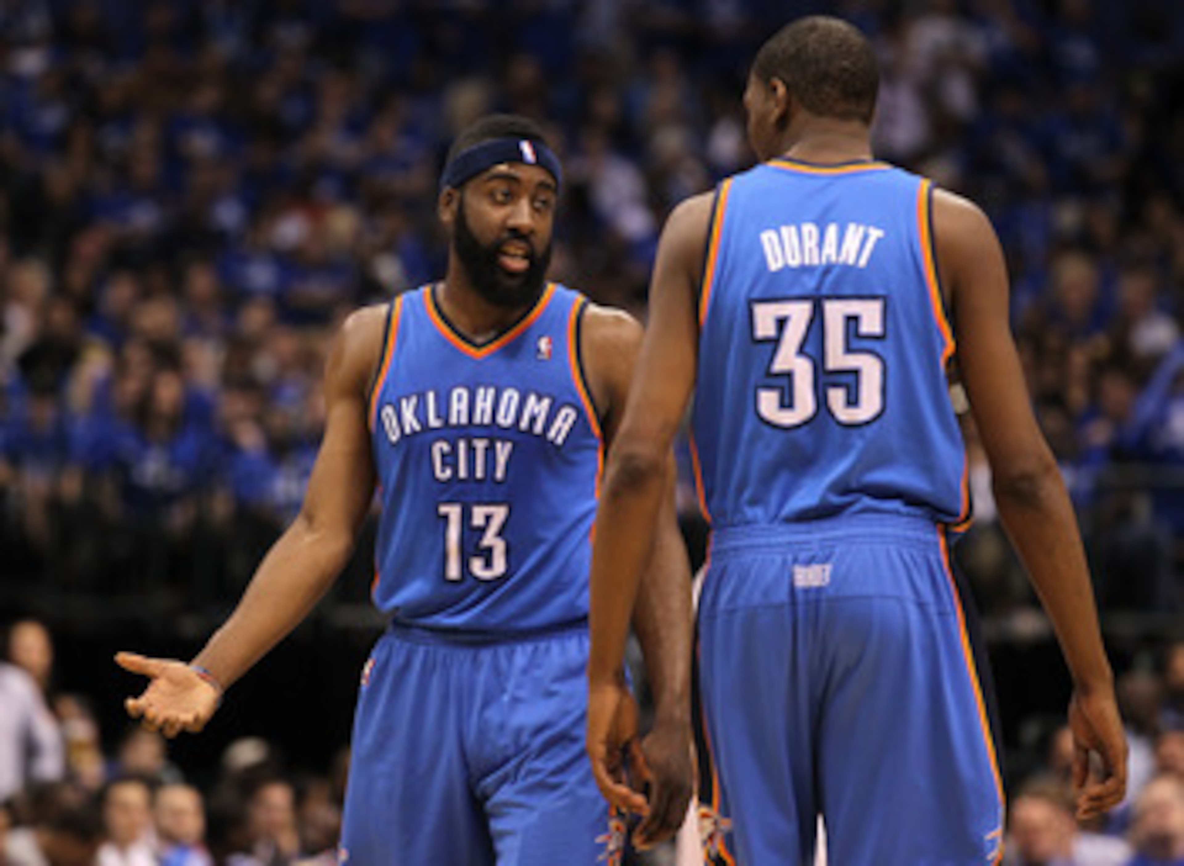 DALLAS, TX - MAY 19:  James Harden #13 of the Oklahoma City Thunder talks with Kevin Durant #35 in the first half while taking on the Dallas Mavericks in Game Two of the Western Conference Finals during the 2011 NBA Playoffs at American Airlines Center on
