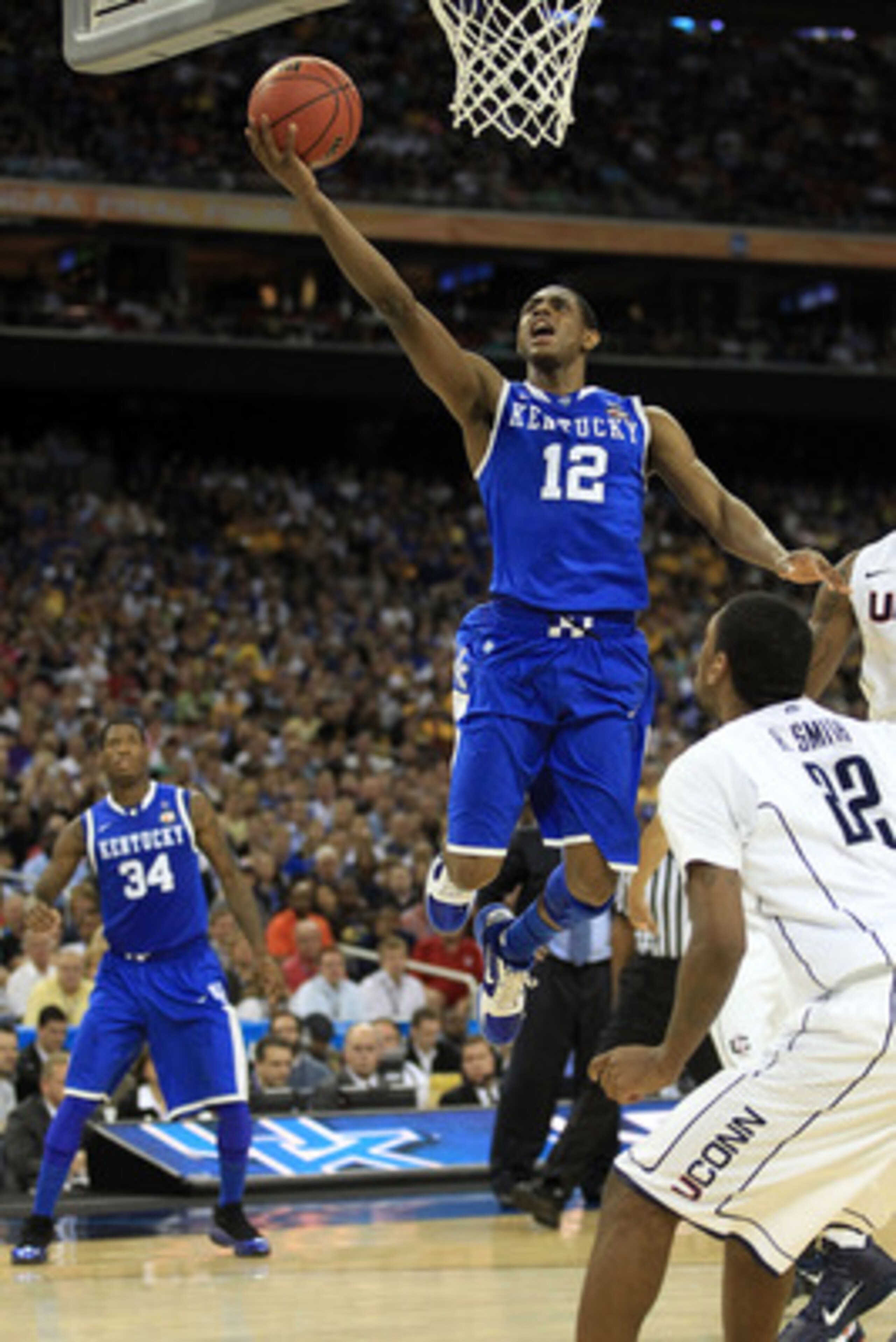 HOUSTON, TX - APRIL 02: Brandon Knight #12 of the Kentucky Wildcats goes to the basket against the Connecticut Huskies during the National Semifinal game of the 2011 NCAA Division I Men's Basketball Championship at Reliant Stadium on April 2, 2011 in Hou HOUSTON, TX - APRIL 02: Brandon Knight #12 of the Kentucky Wildcats goes to the basket against the Connecticut Huskies during the National Semifinal game of the 2011 NCAA Division I Men's Basketball Championship at Reliant Stadium on April 2, 2011 in Hou