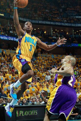 NEW ORLEANS, LA - APRIL 22:  Chris Paul #3 of the New Orleans Hornets shoots the ball over Derek Fisher #2  of the Los Angeles Lakers in Game Three of the Western Conference Quarterfinals in the 2011 NBA Playoffs at the New Orleans Arena  on April 22, 201