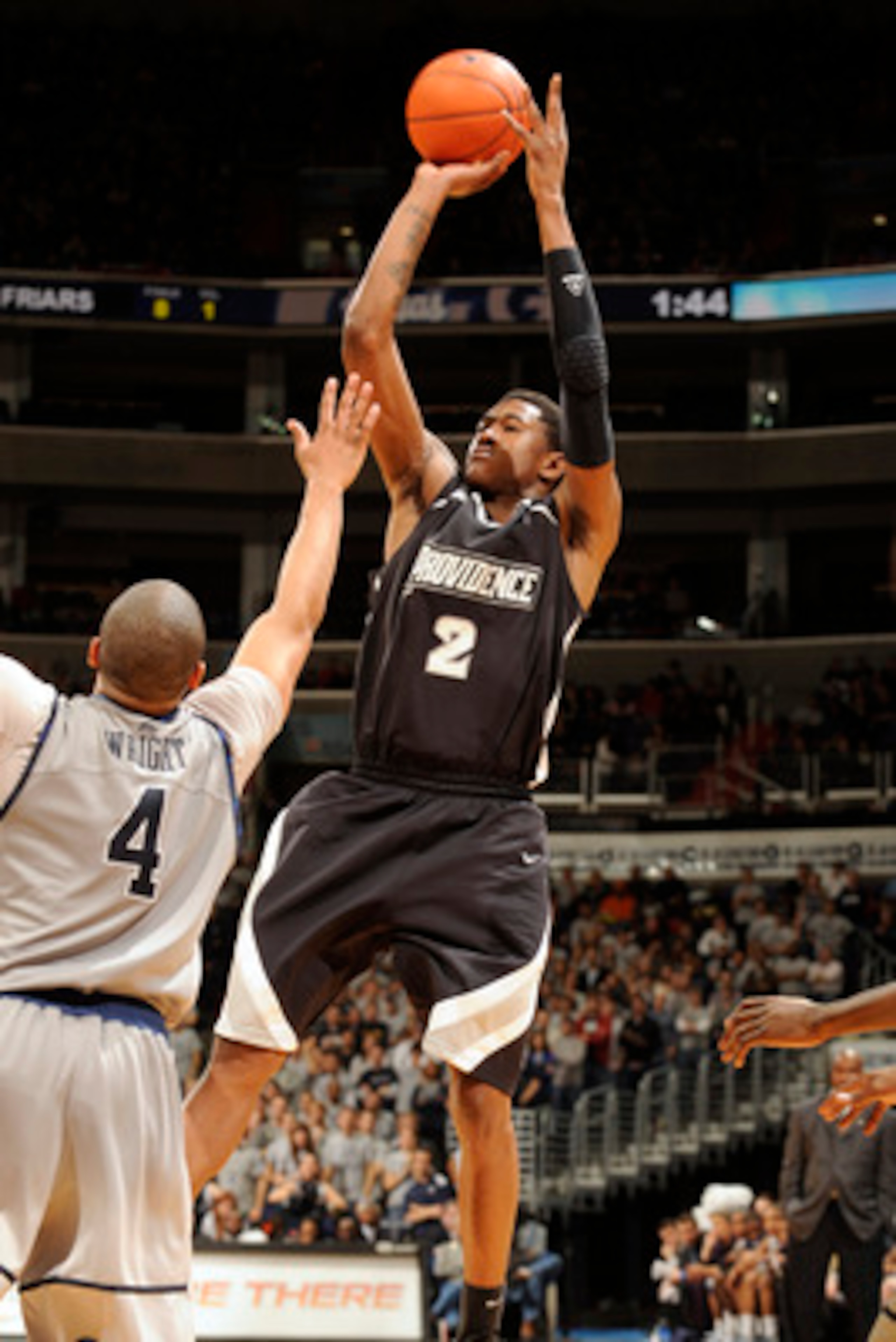 WASHINGTON, DC - FEBRUARY 5: Marshon Brooks #2 of the Providence Friars takes a jump shot over Chris Wright #4 of the Georgetown Hoays during a college basketball game on February 5, 2011 at the Verizon Center in Washington, DC. The Hoyas won 83-81. (P WASHINGTON, DC - FEBRUARY 5: Marshon Brooks #2 of the Providence Friars takes a jump shot over Chris Wright #4 of the Georgetown Hoays during a college basketball game on February 5, 2011 at the Verizon Center in Washington, DC. The Hoyas won 83-81. (P