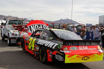 LAS VEGAS, NV - MARCH 06:  The #24 DuPont Chevrolet, driven by Jeff Gordon, is towed into the garage after crashing during the NASCAR Sprint Cup Series Kobalt Tools 400 at Las Vegas Motor Speedway on March 6, 2011 in Las Vegas, Nevada.  (Photo by Todd War