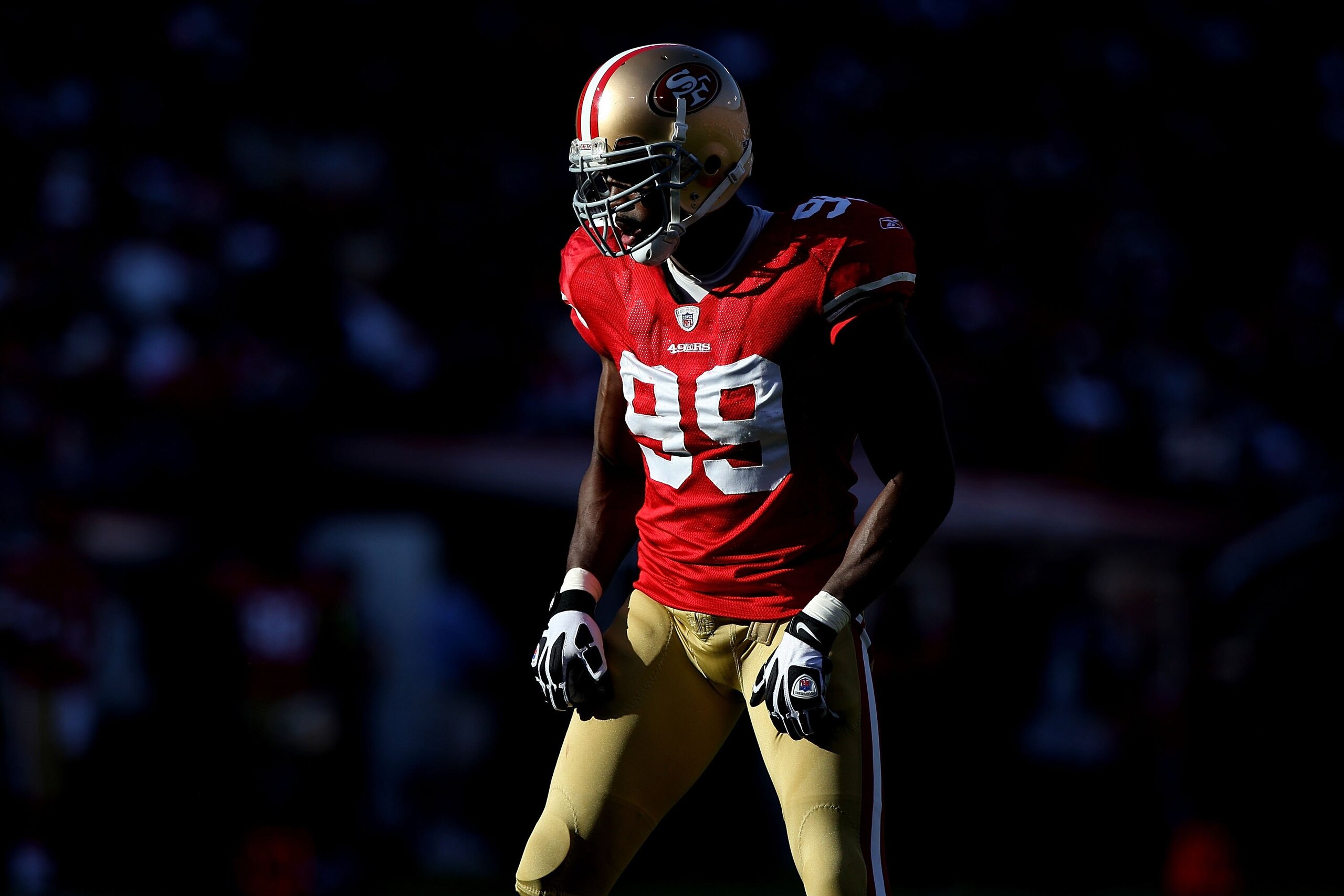 SAN FRANCISCO - NOVEMBER 08:  Manny Lawson #99 of the San Francisco 49ers looks on against the Tennessee Titans during an NFL game on November 8, 2009 at Candlestick Park in San Francisco, California.  (Photo by Jed Jacobsohn/Getty Images)