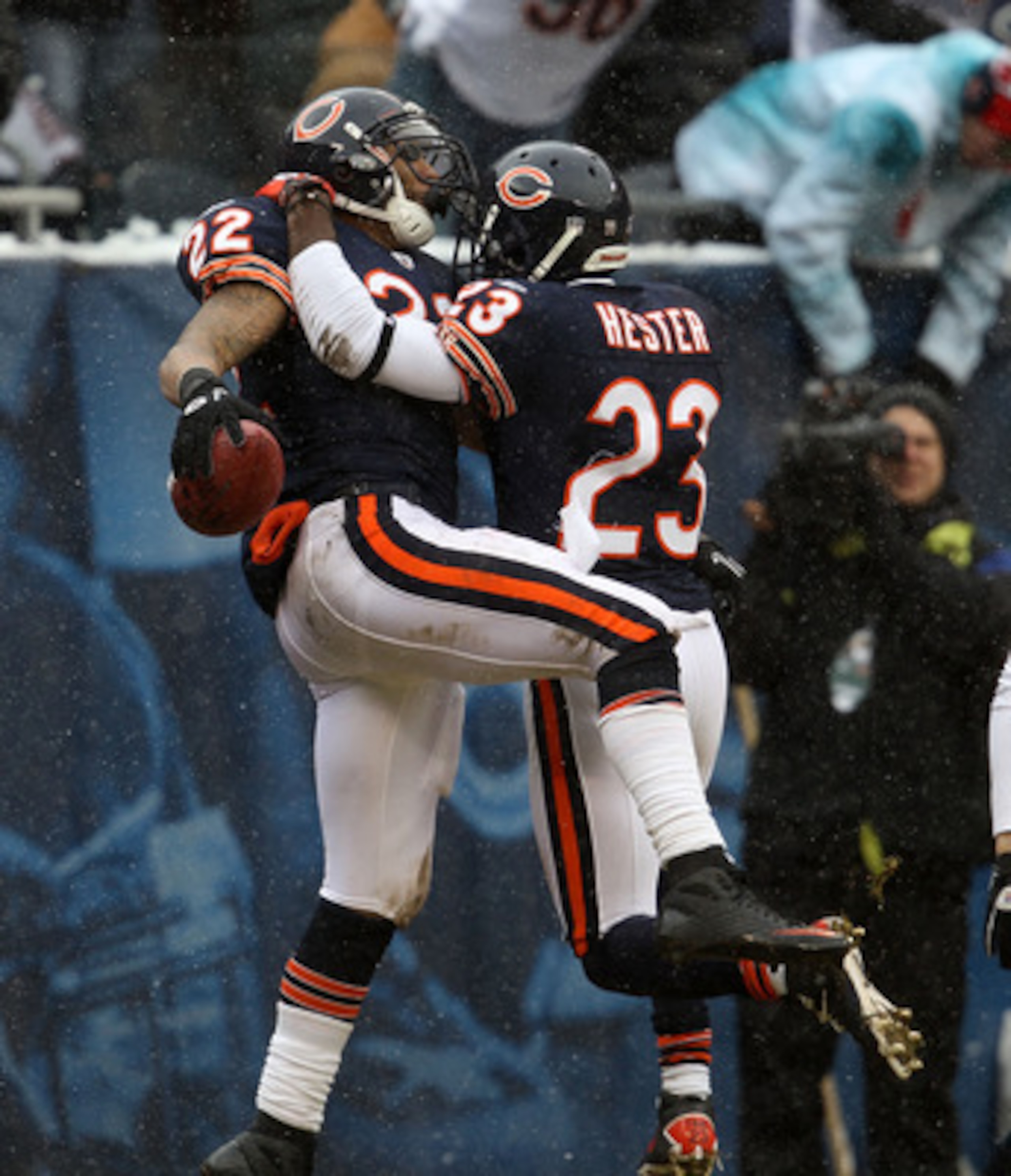 CHICAGO, IL - DECEMBER 26: Matt Forte #22 of the Chicago Bears is greeted by teammate Devin Hester #23 after scoring a touchdown against the New York Jets at Soldier Field on December 26, 2010 in Chicago, Illinois. The Bears defeated the Jets 38-34. (Phot CHICAGO, IL - DECEMBER 26: Matt Forte #22 of the Chicago Bears is greeted by teammate Devin Hester #23 after scoring a touchdown against the New York Jets at Soldier Field on December 26, 2010 in Chicago, Illinois. The Bears defeated the Jets 38-34. (Phot