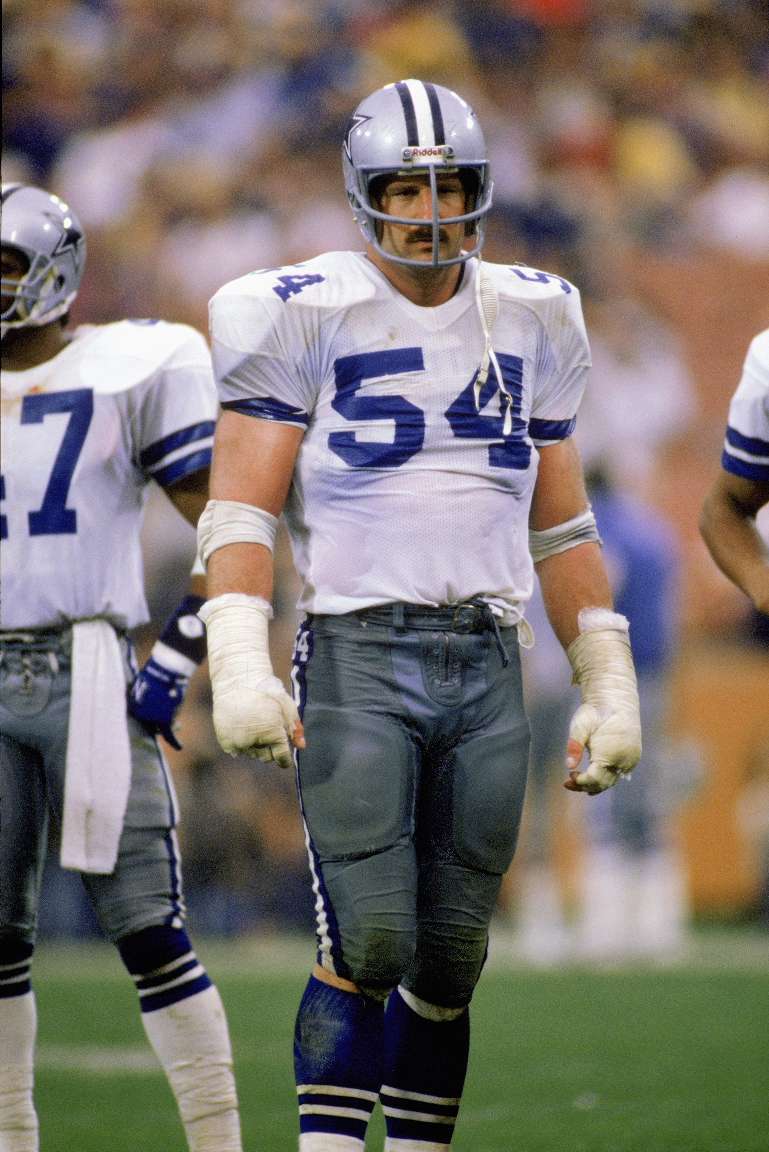 1986: Defensive lineman Randy White #54 of the Dallas Cowboys stands on the field between plays during a 1986 NFL game. (Photo by Stephen Dunn/Getty Images) 1986: Defensive lineman Randy White #54 of the Dallas Cowboys stands on the field between plays during a 1986 NFL game. (Photo by Stephen Dunn/Getty Images)