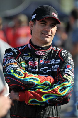 CHARLOTTE, NC - MAY 20:  Jeff Gordon, driver of the #24 DuPont Chevrolet, stands on the grid during qualifying for the NASCAR Sprint All-Star Race at Charlotte Motor Speedway on May 20, 2011 in Charlotte, North Carolina.  (Photo by Drew Hallowell/Getty Im