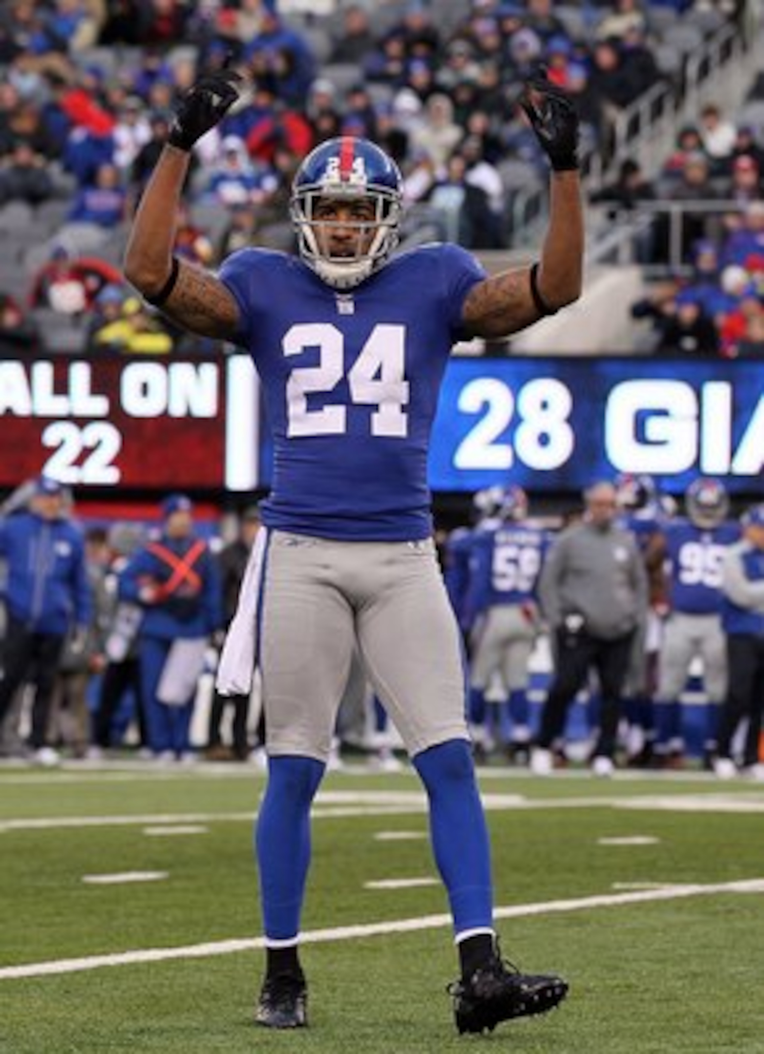 EAST RUTHERFORD, NJ - DECEMBER 05:  Terrell Thomas #24 of the New York Giants fires up the crowd against the Washington Redskins on December 5, 2010 at the New Meadowlands Stadium in East Rutherford, New Jersey. The Giants defeated the Redskins 31-7.  (Ph