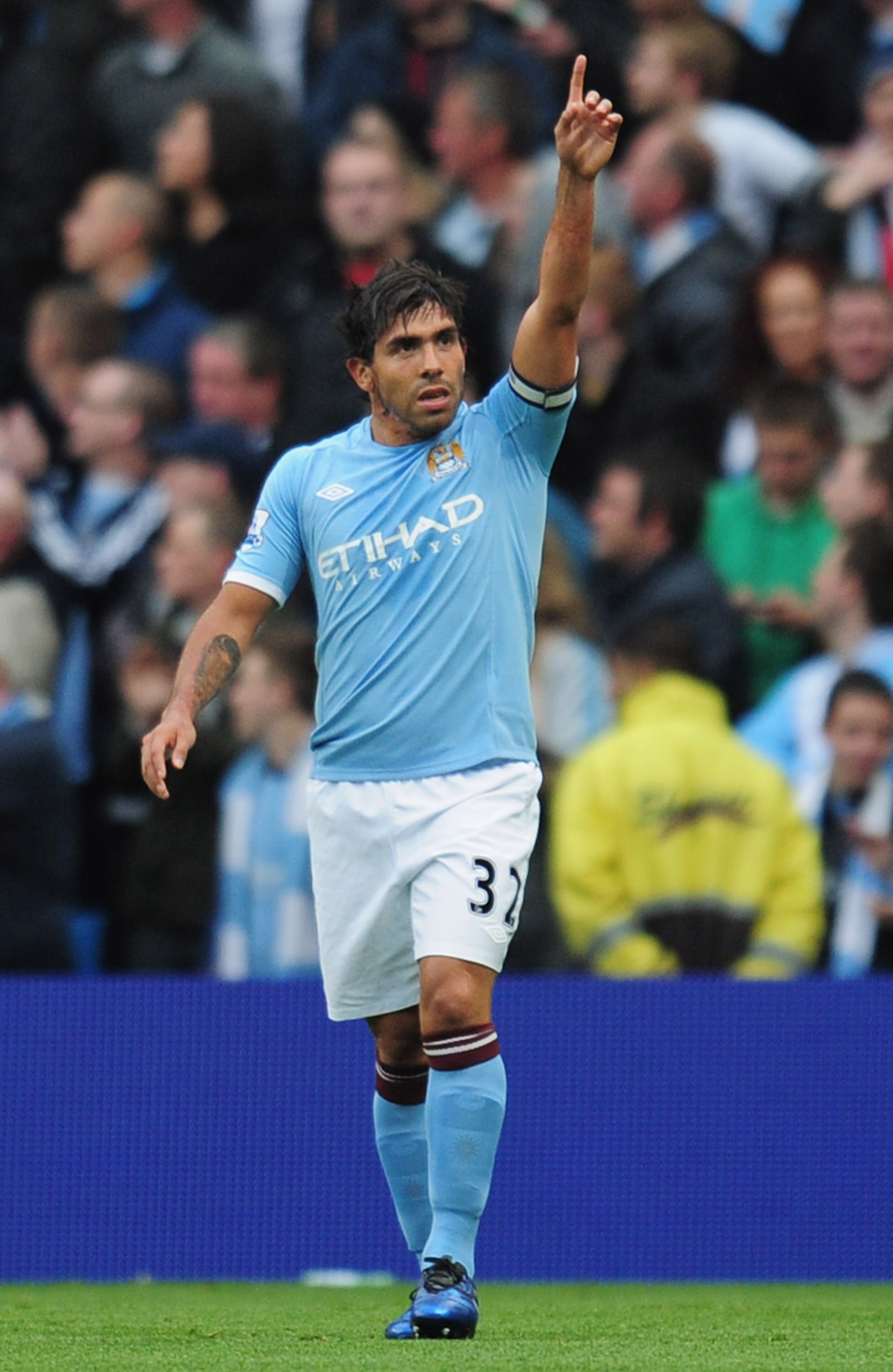 MANCHESTER, ENGLAND - MAY 17:  Carlos Tevez of Manchester City celebrates after scoring during the Barclays Premier League match between Manchester City and Stoke City at City of Manchester Stadium on May 17, 2011 in Manchester, England.  (Photo by Shaun