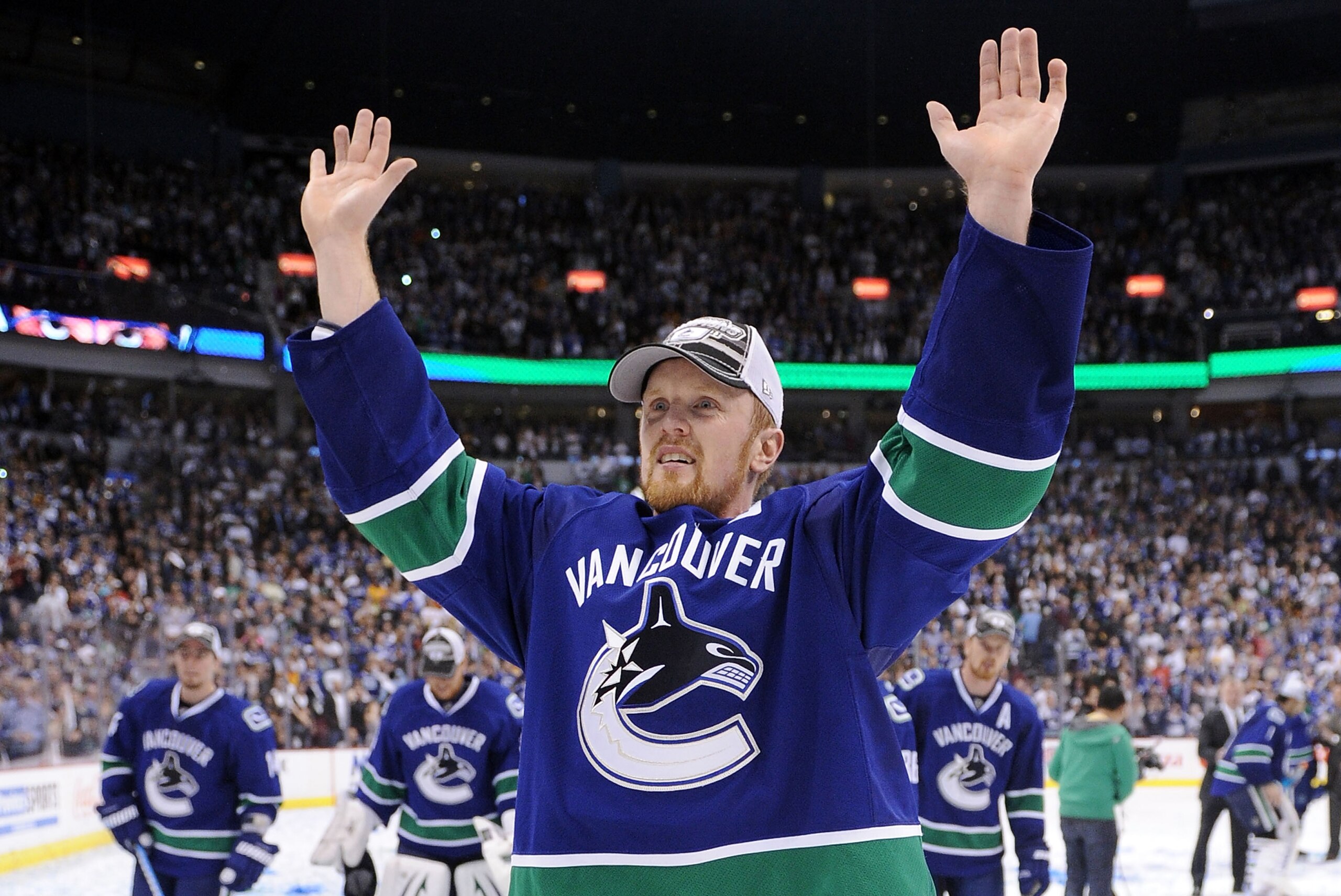 VANCOUVER, CANADA - MAY 24:  Henrik Sedin #33 of the Vancouver Canucks acknowledges the fans after the Canucks defeated the San Jose Sharks 3-2 in double-overtime in Game Five to win the Western Conference Finals during the 2011 Stanley Cup Playoffs at Ro